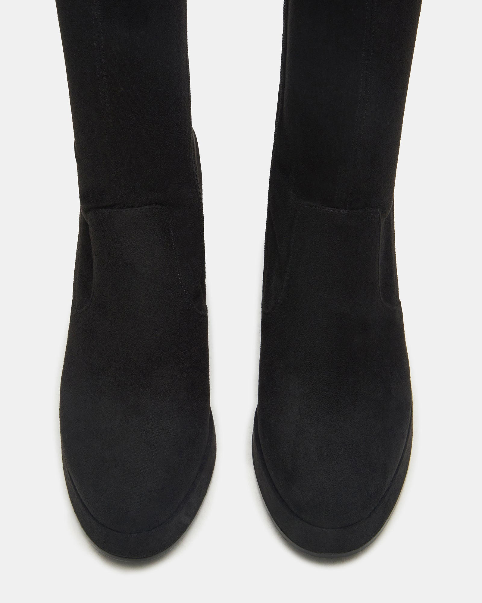 Side view of black knee-high boots showcasing block heel and rounded toe.