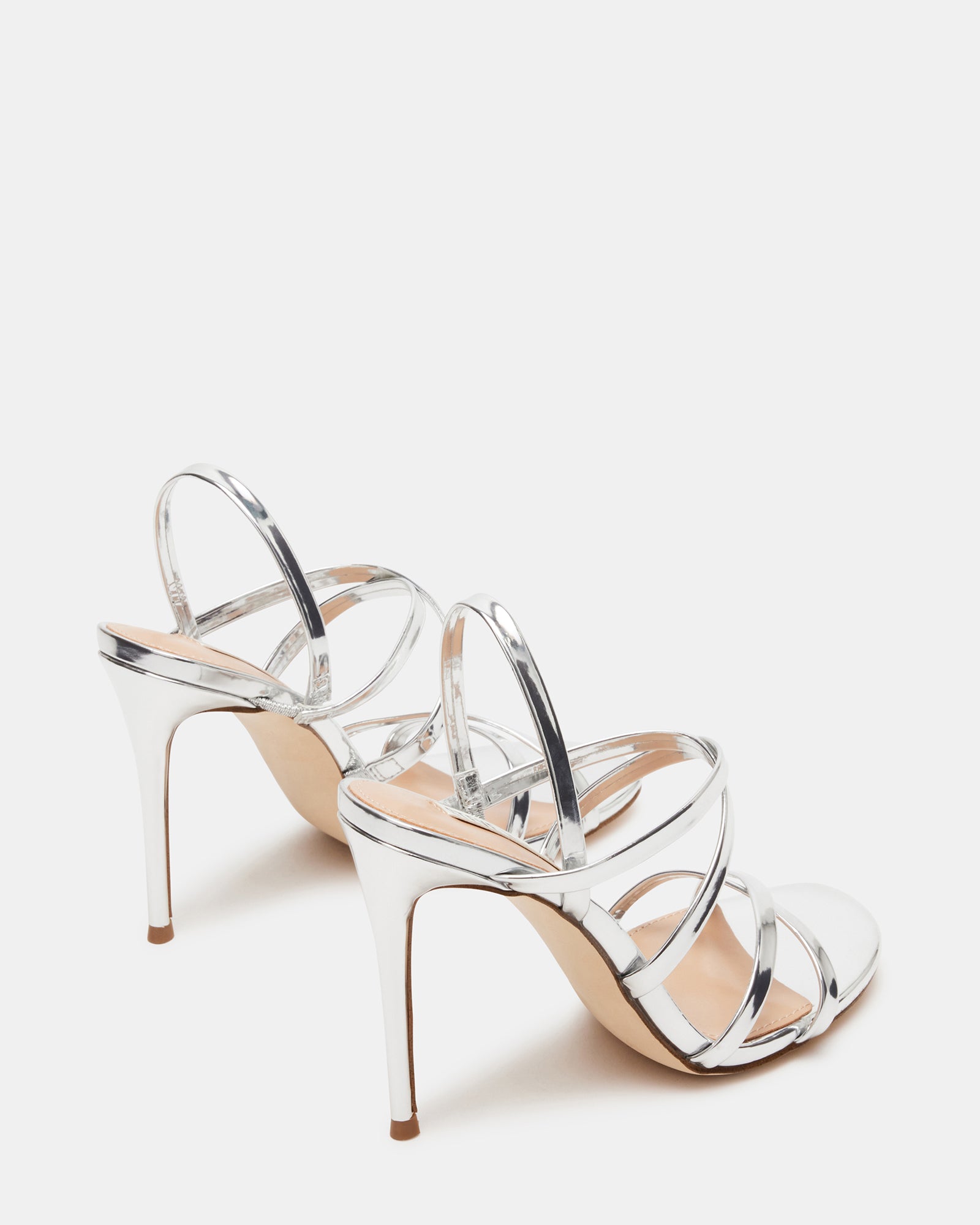Close-up of Tylah silver platform heels showcasing the synthetic material.