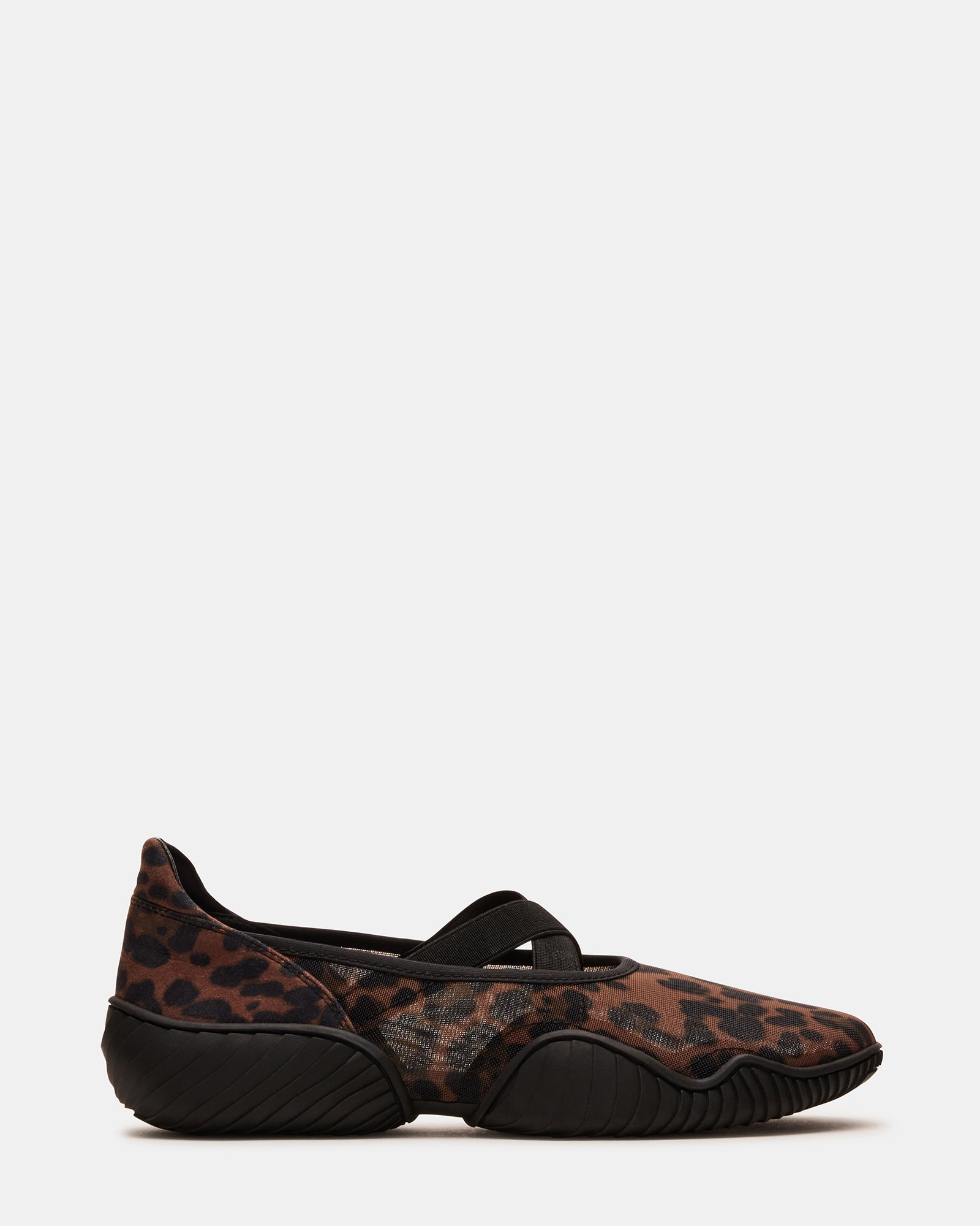 VADOR sneakers side profile showing leopard detail and mesh texture