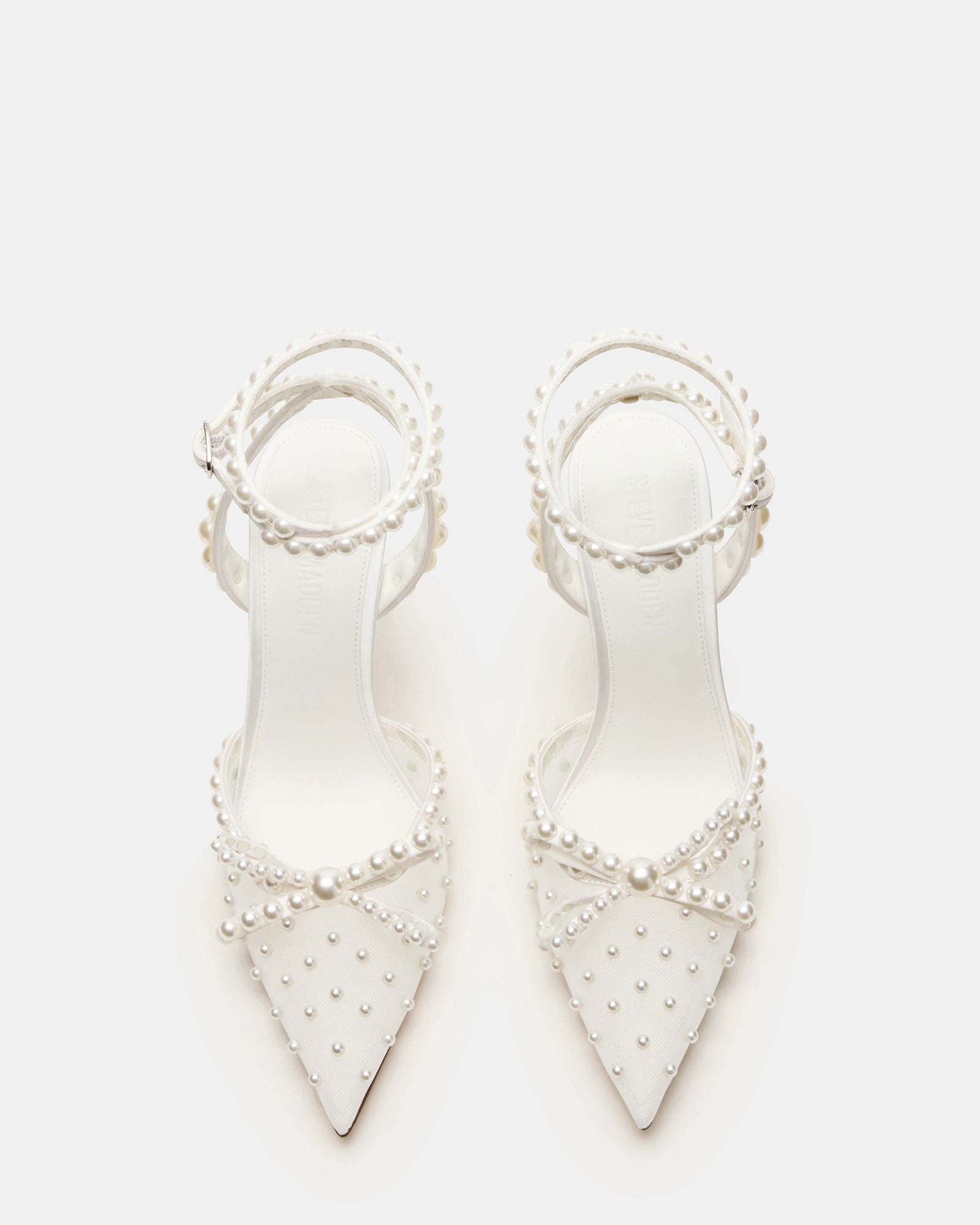 Close-up of the pointed toe design on VAL ivory heels