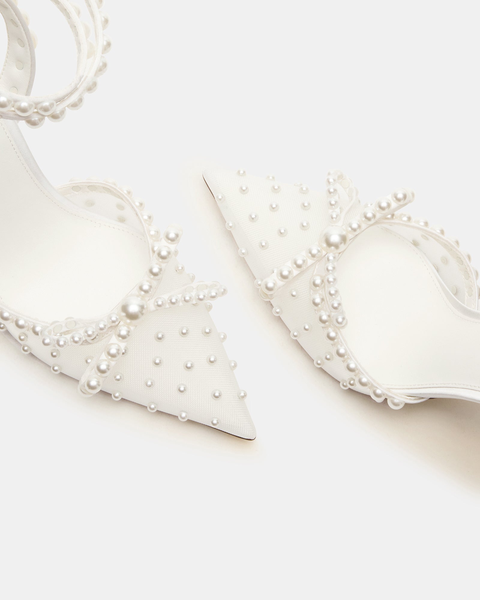 Side view of VAL ivory heels with mesh and pearl details for formal wear