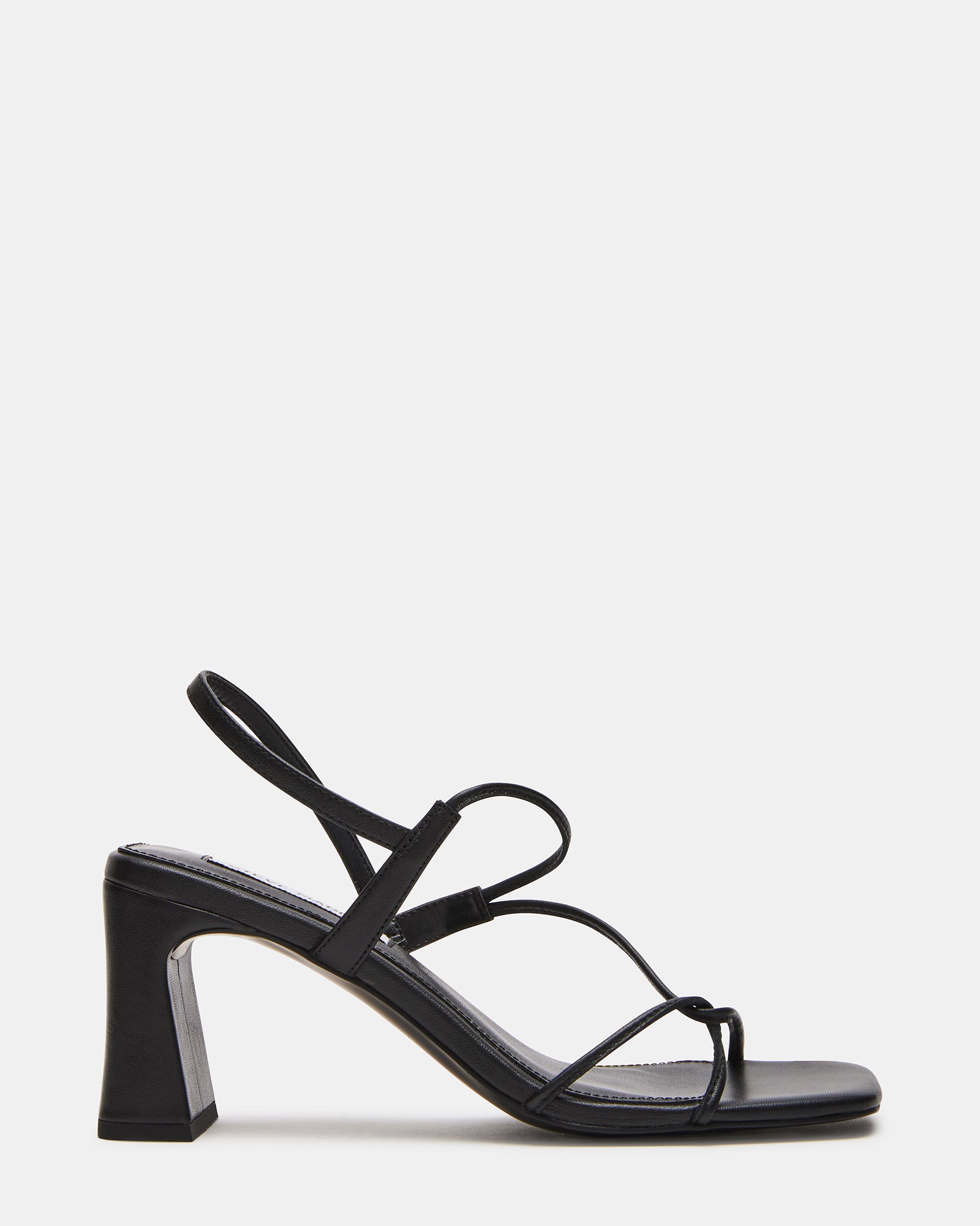 Close-up side profile of the black leather high heel shoes highlighting texture