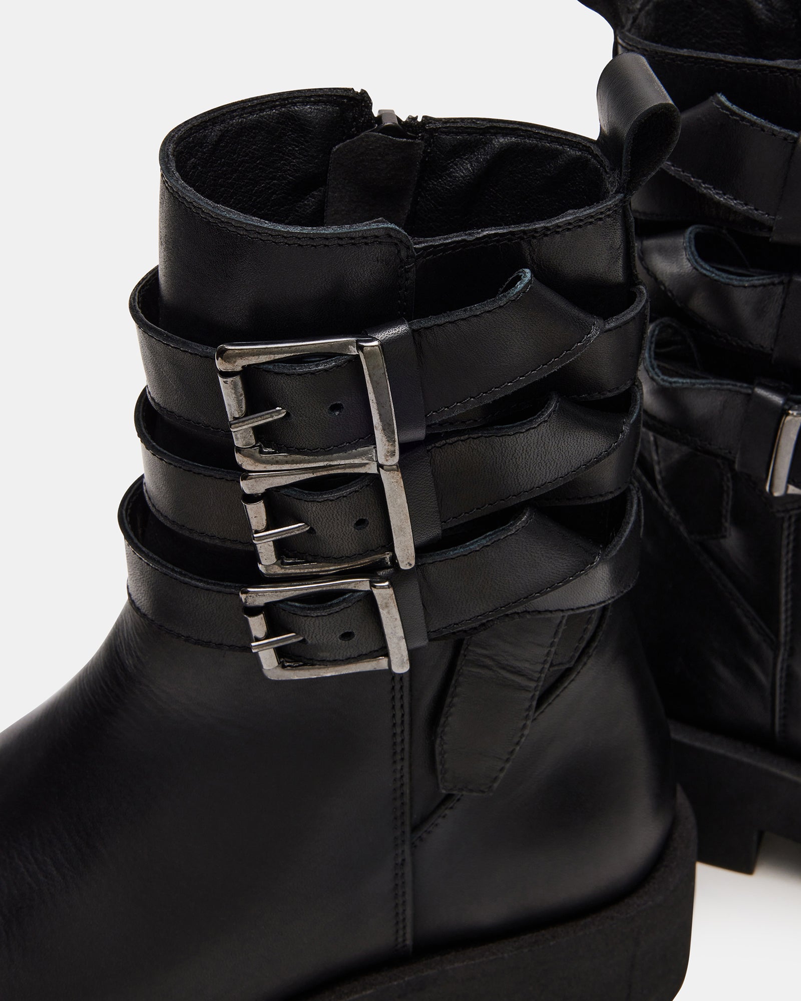Front angle of combat boots women can wear for edgy daytime or nighttime looks