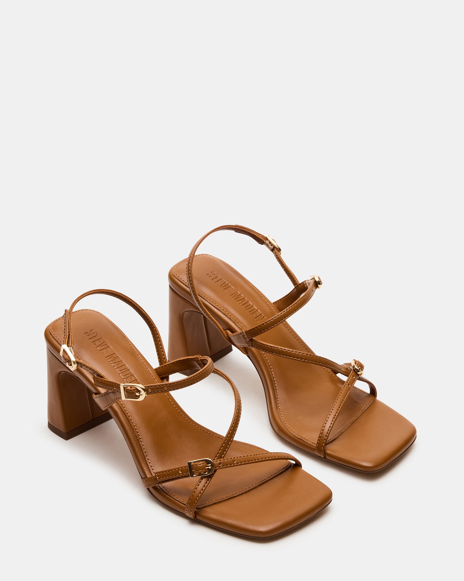 Close-up of the vegan leather upper of the square toe heels.
