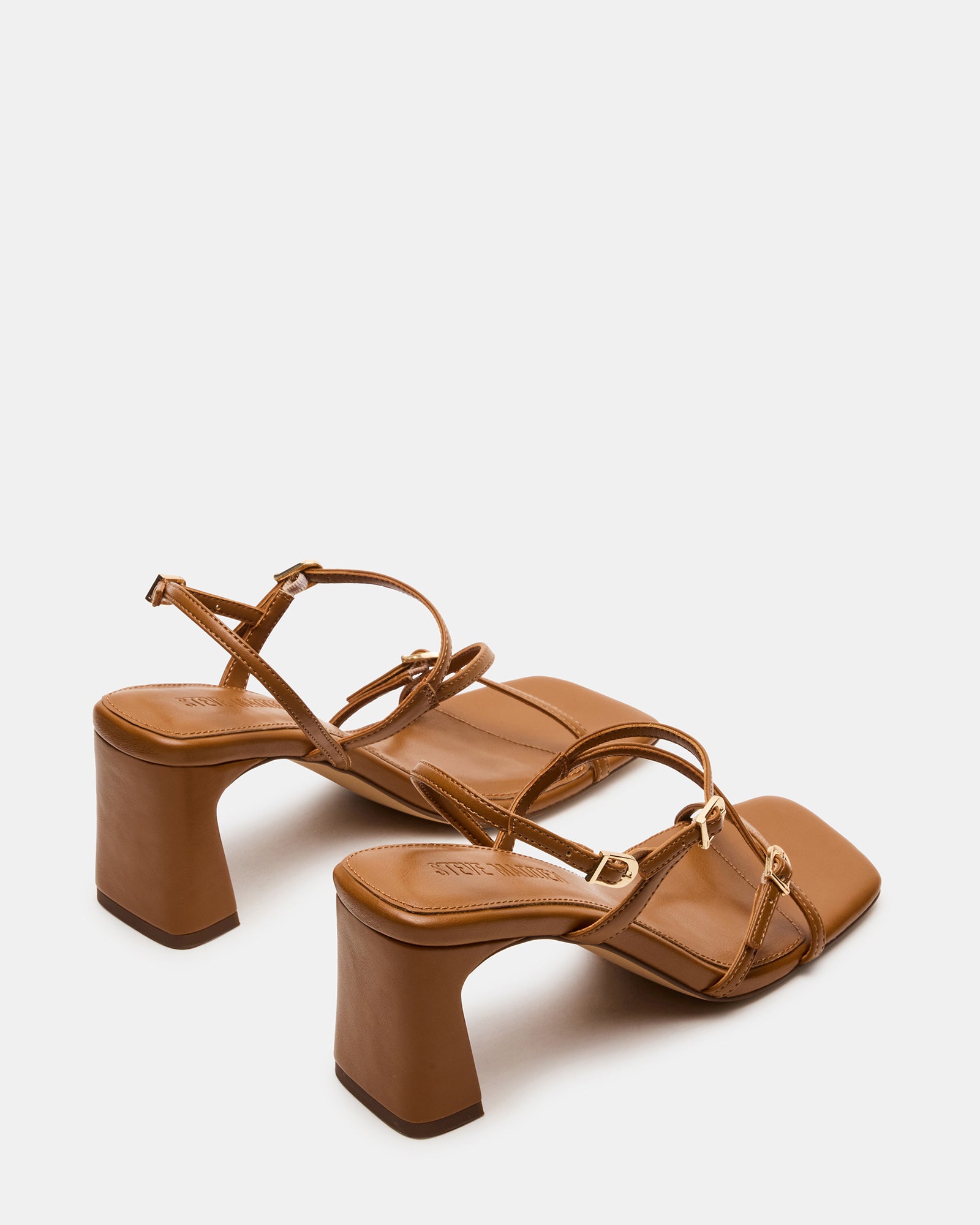 Close-up of the vegan leather upper of the square toe heels.
