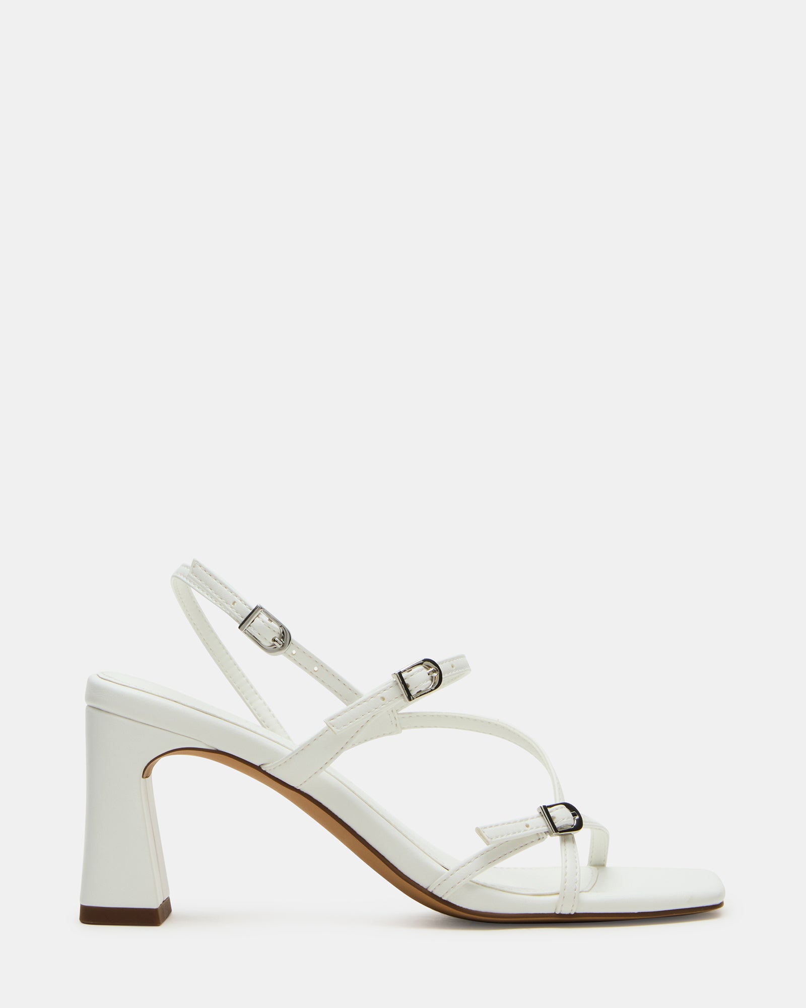 Side view of white slingback heels with square toe and buckle strap