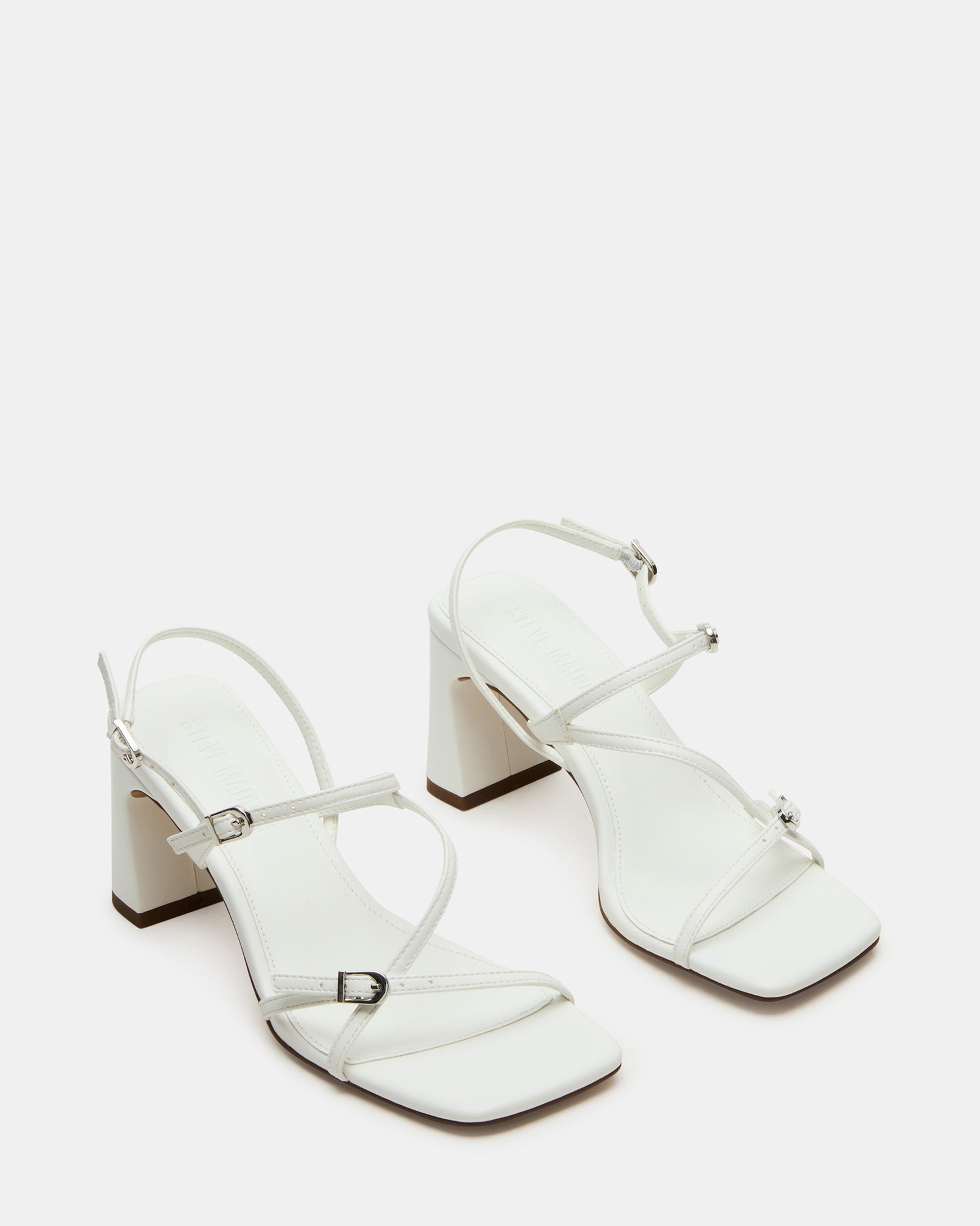 Close-up of vegan leather heels showing square toe and slingback detail