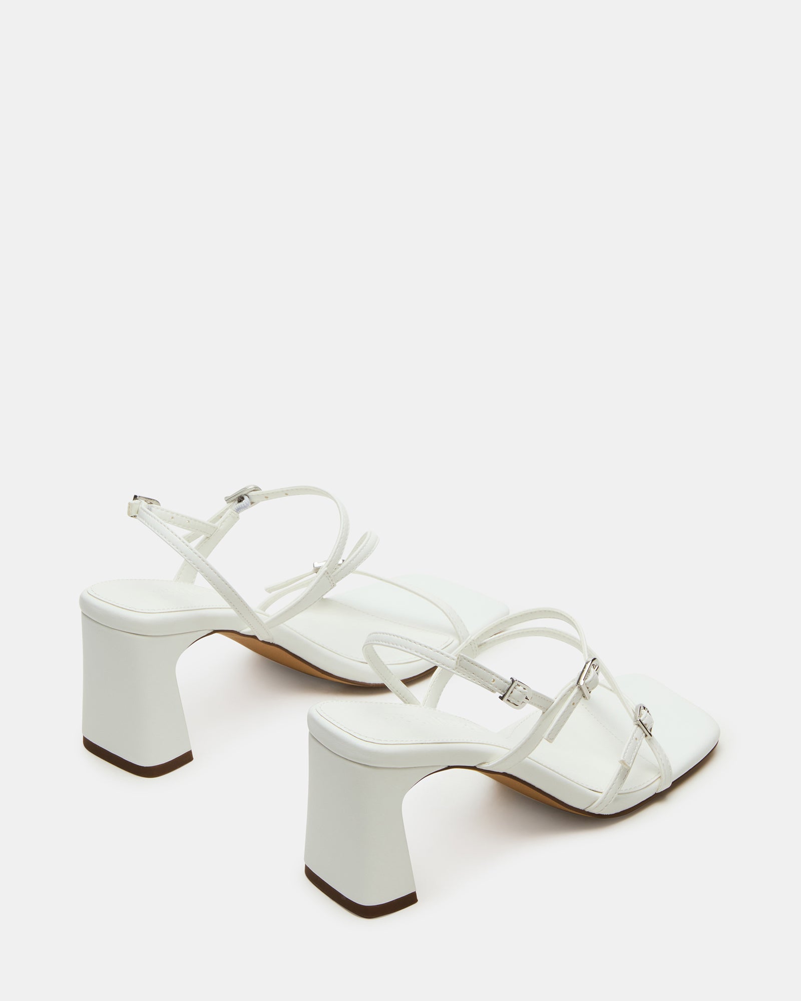 Close-up of vegan leather heels showing square toe and slingback detail
