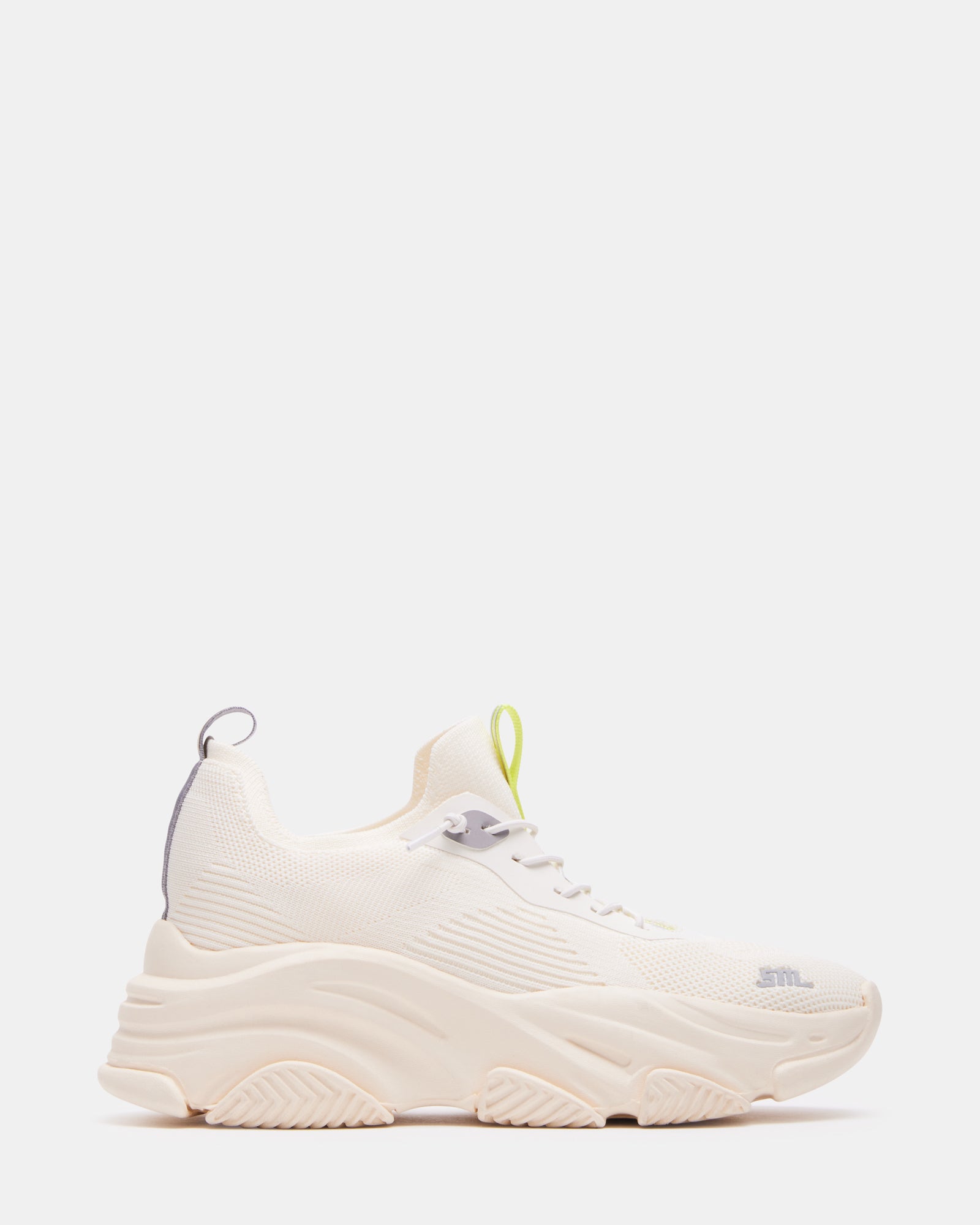 Side view of Comfort Fusion Lace-Up Sneakers, highlighting their stylish design.