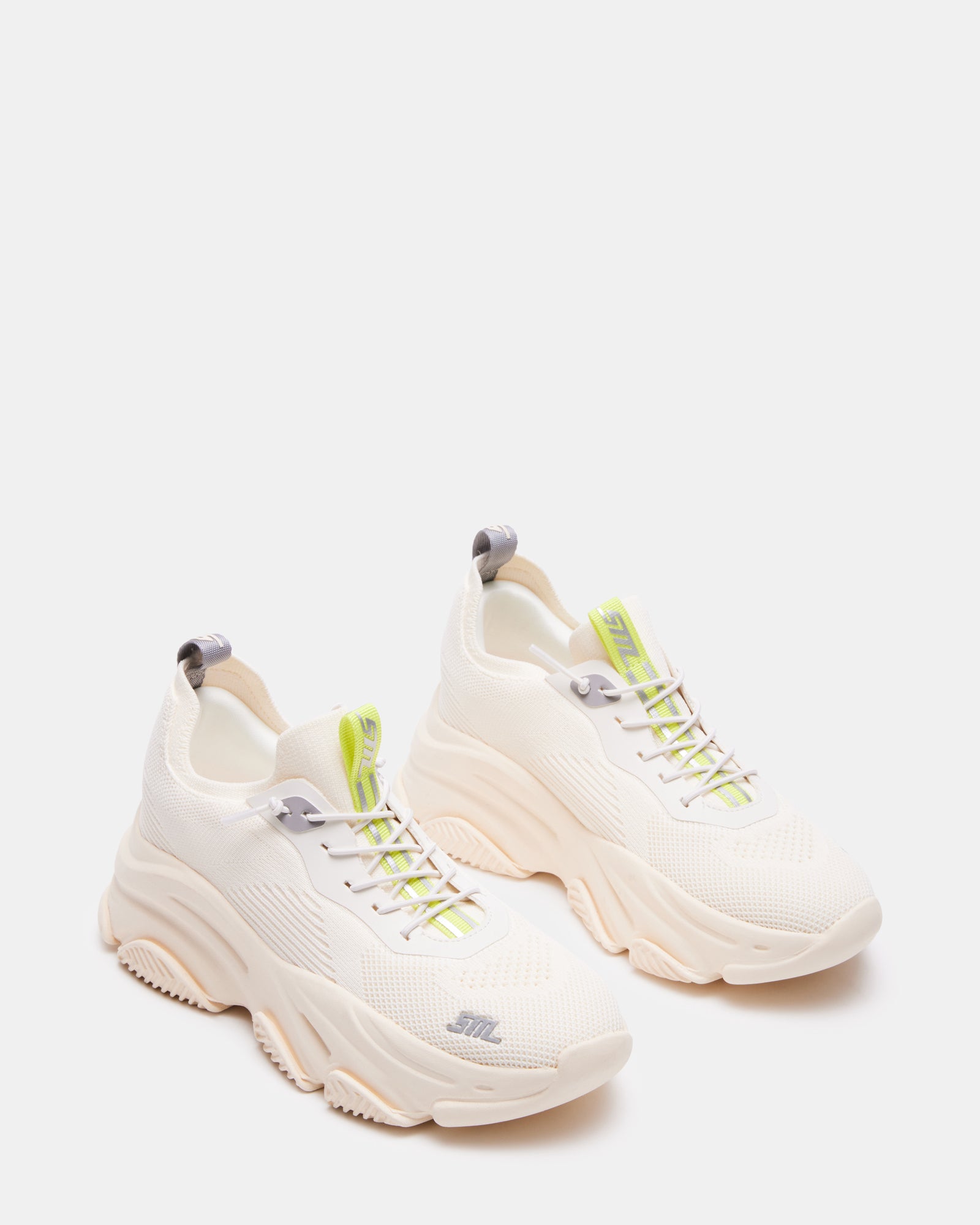Close-up of Comfort Fusion Lace-Up Sneakers, emphasizing the knit fabric and lace-up feature.