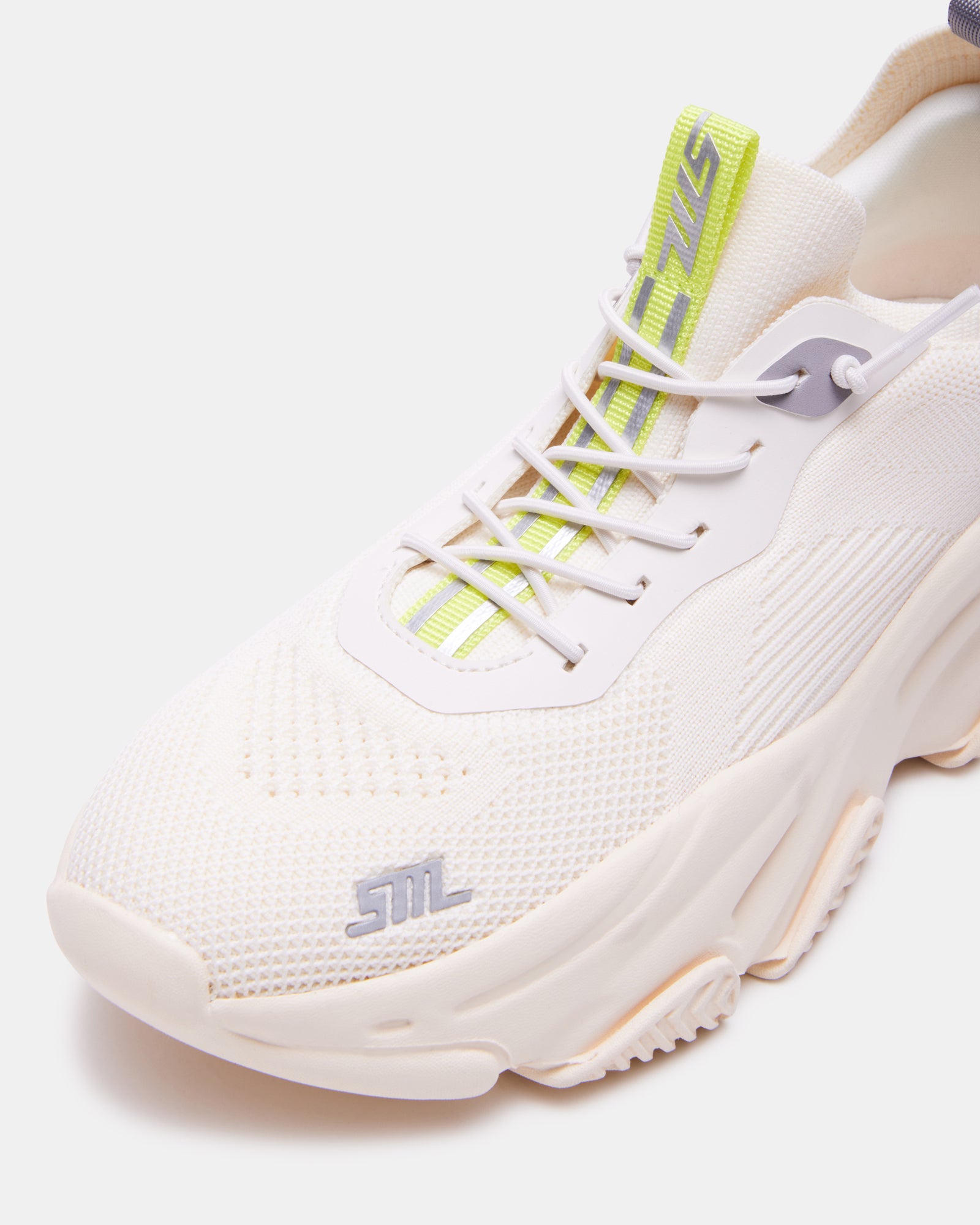 Side view of Comfort Fusion Lace-Up Sneakers, highlighting their stylish design.