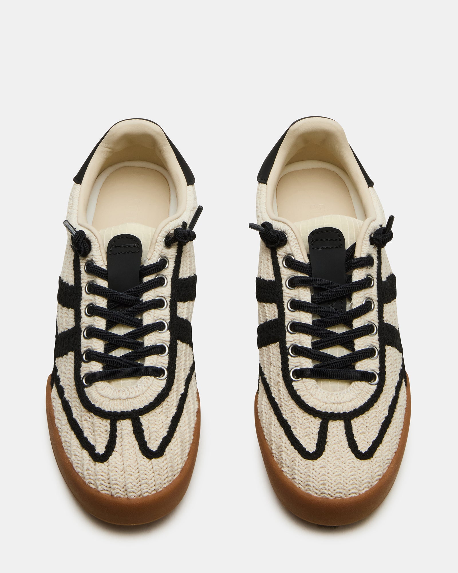 Front view of the low-top lace-up sneakers with stylish crochet pattern