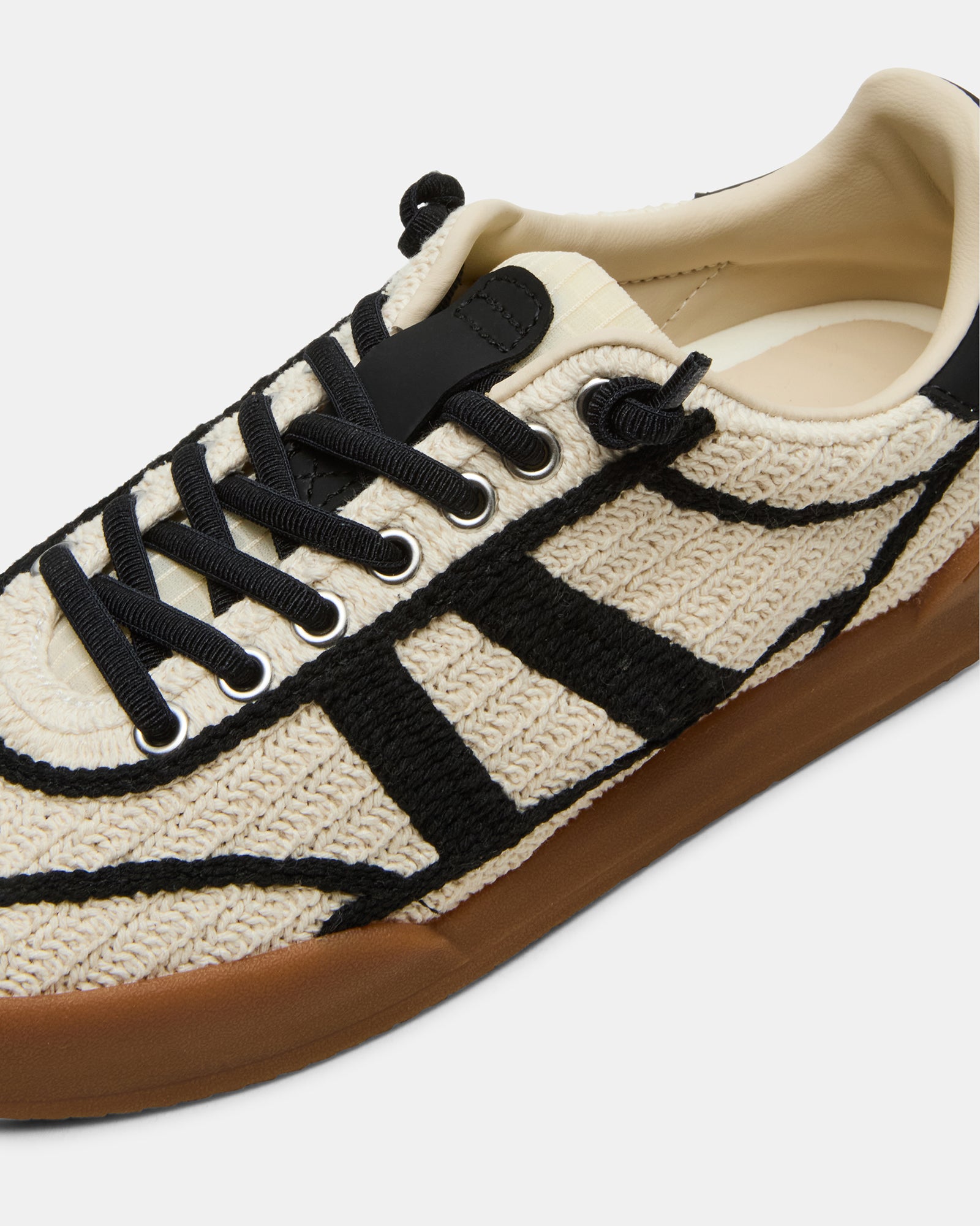 Side view of the Aloha crochet sneakers highlighting the cream leather accents