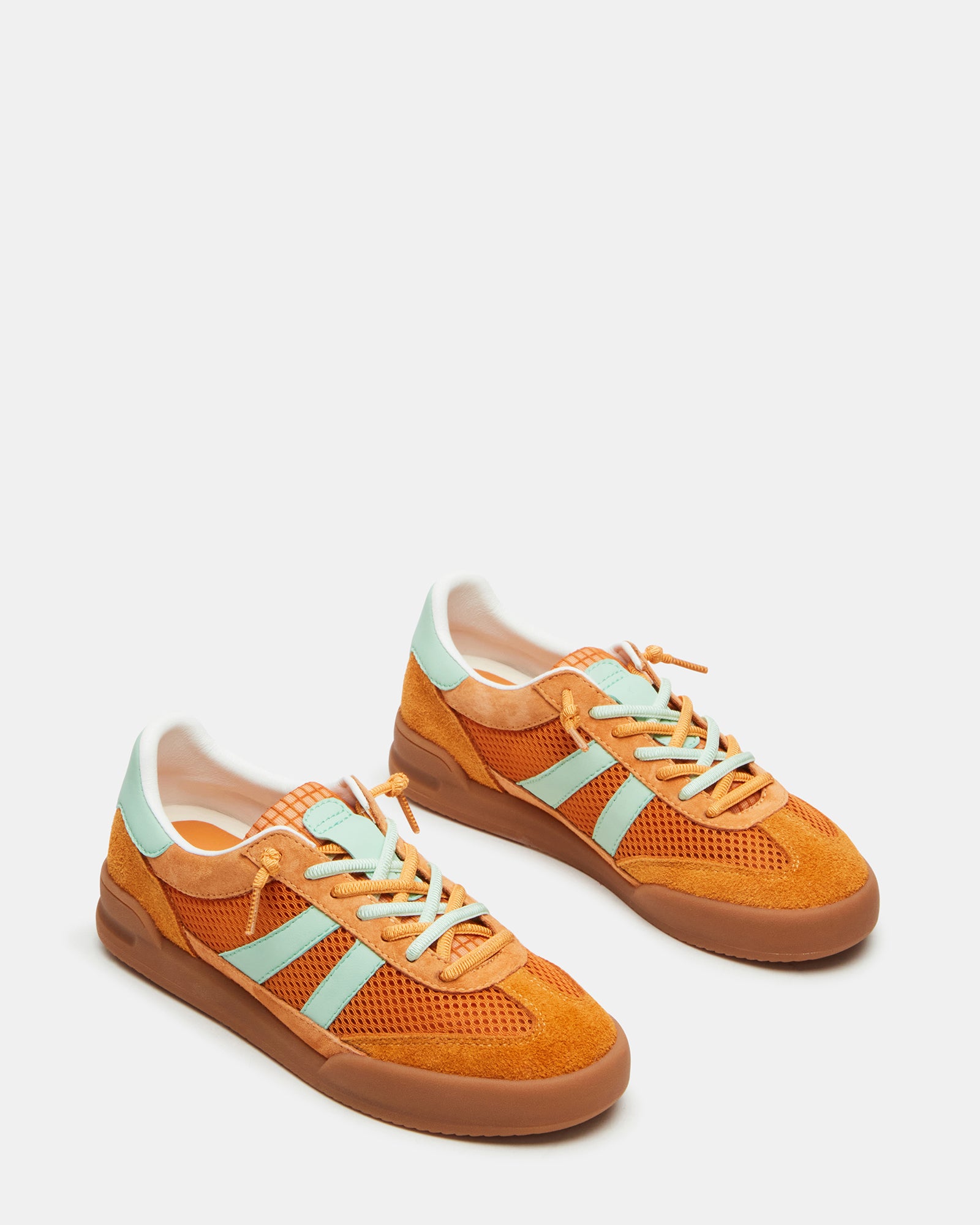 On-foot view of these comfortable sneakers styled with casual jeans.