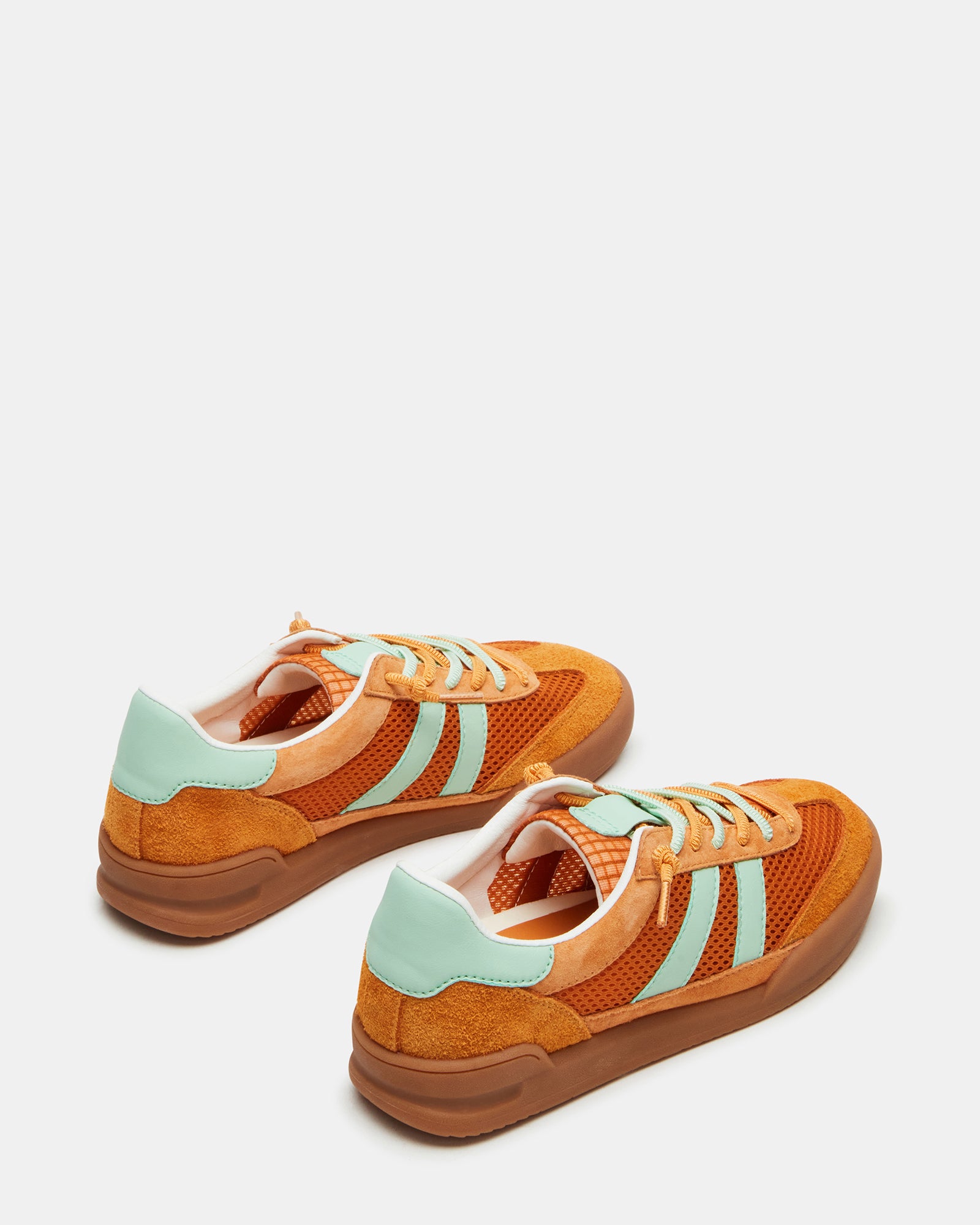 On-foot view of these comfortable sneakers styled with casual jeans.