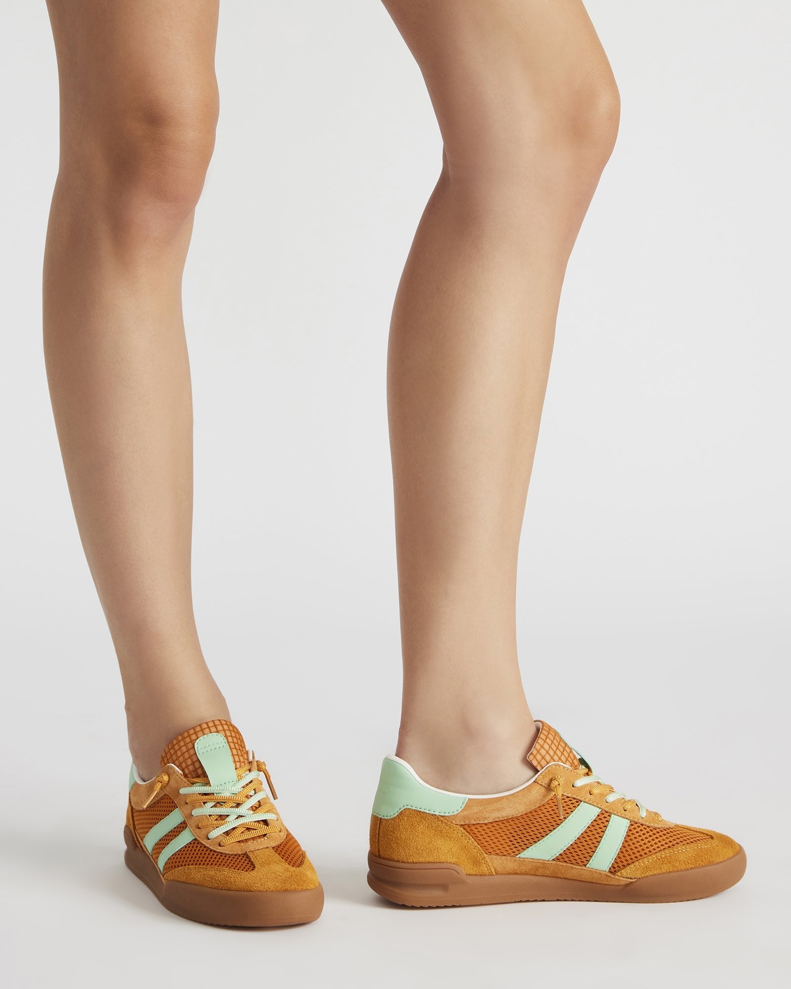 Close-up of the textured suede and synthetic upper materials.