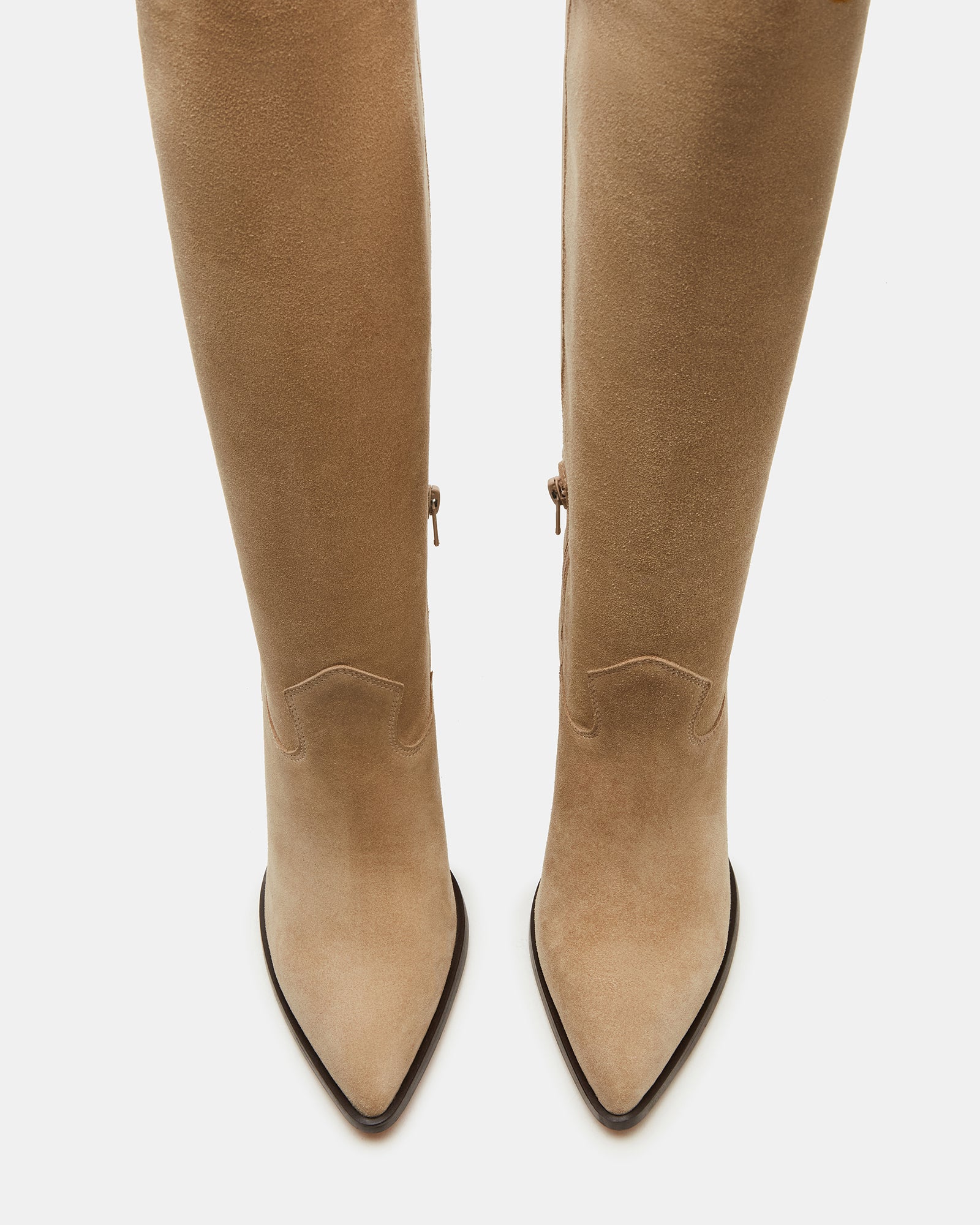Taupe suede boots side profile showing pointed toe and knee-high shaft