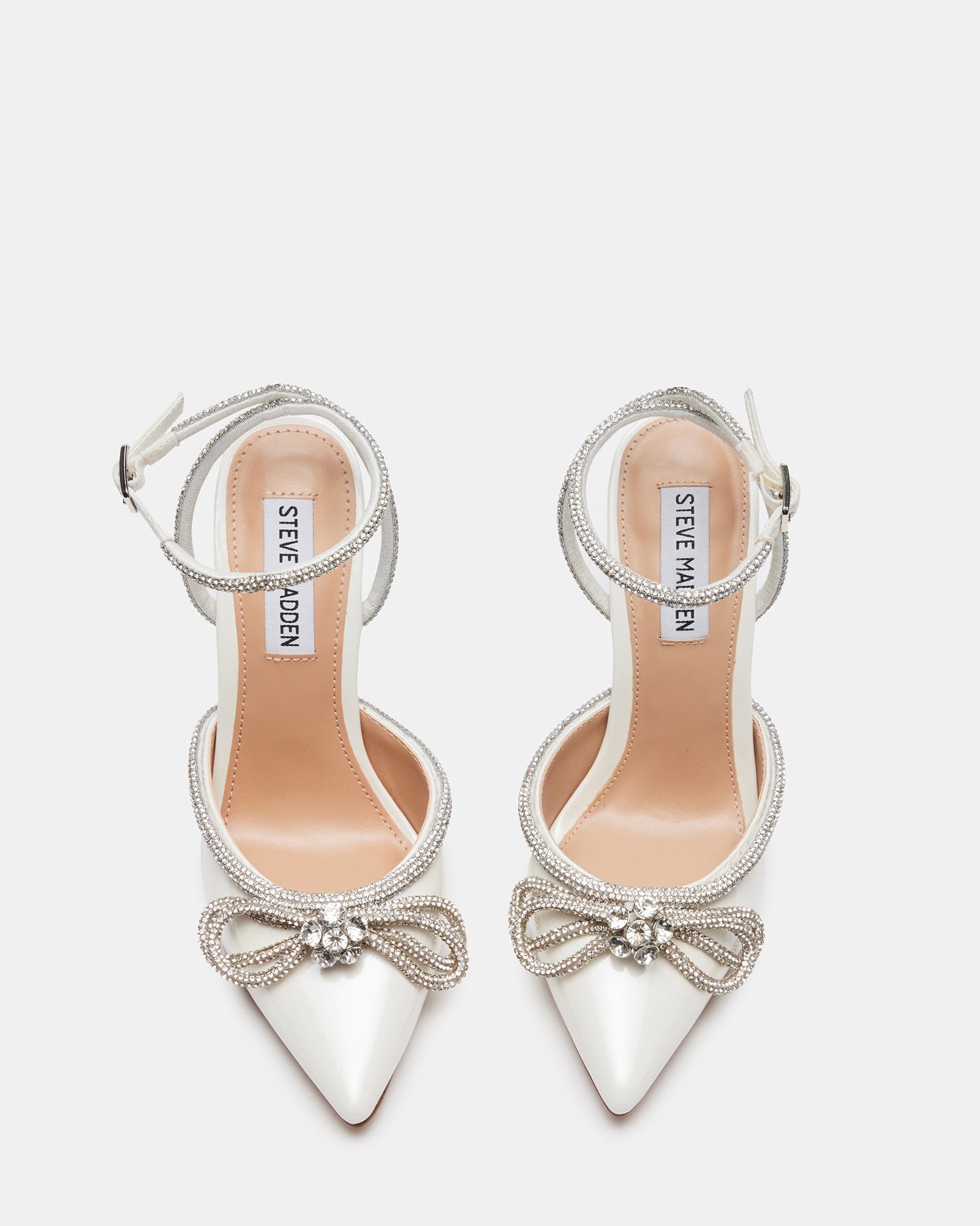 Elegant off-white rhinestone stiletto heels from the side.