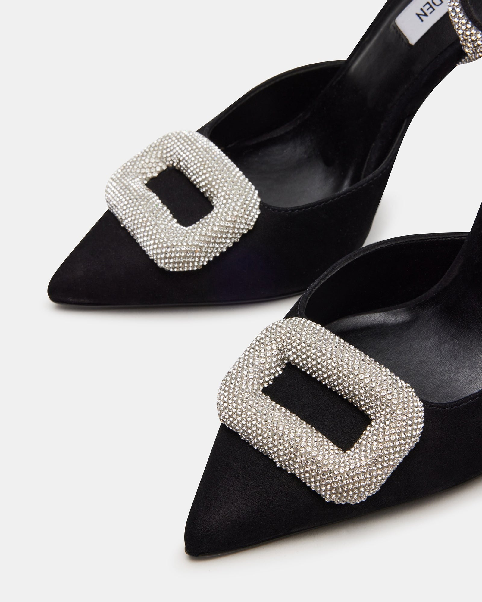 Side view of Vienna Black stiletto heels with rhinestone ankle strap highlighting the pointed toe