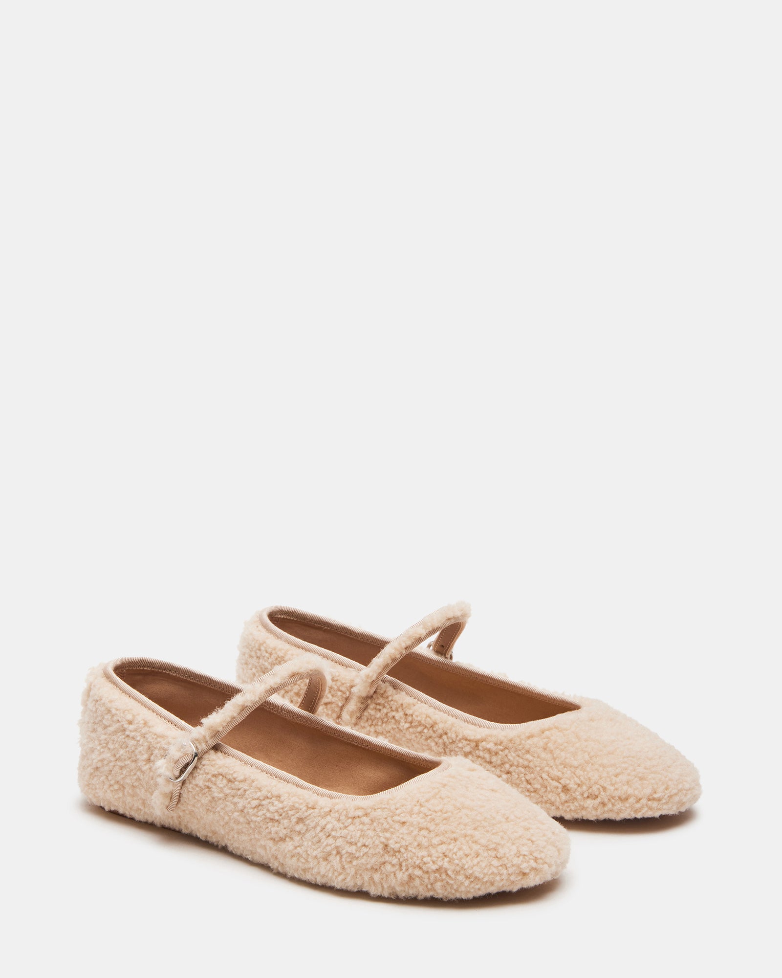 Top-down angle highlighting the flat sole and Mary Jane design