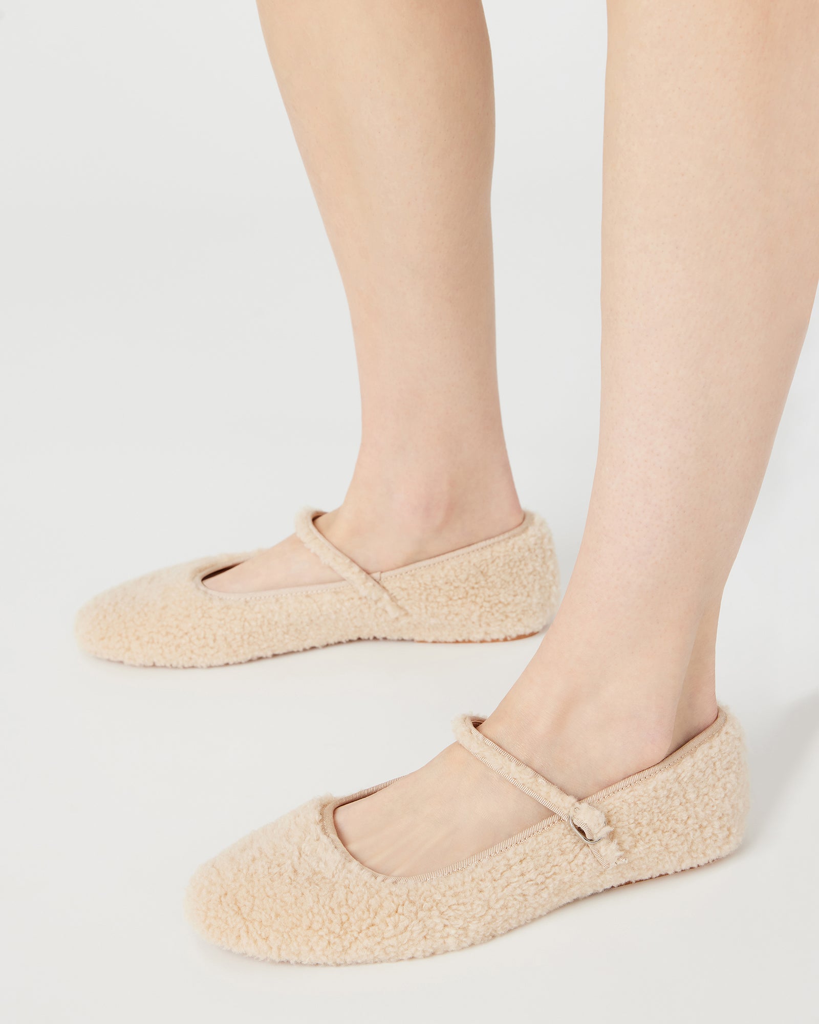 Close-up of soft faux shearling texture on the Vinetta shoes