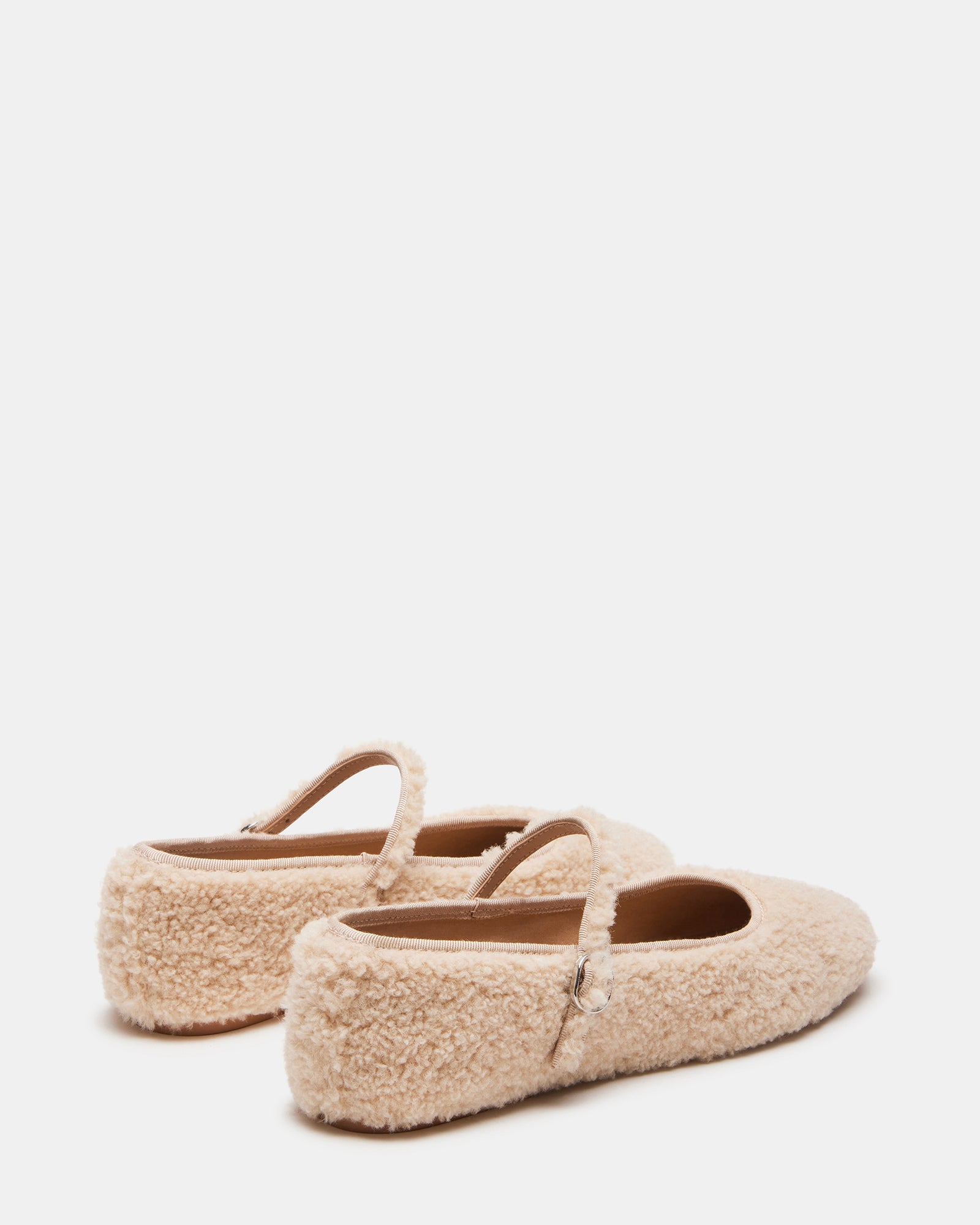 Top-down angle highlighting the flat sole and Mary Jane design