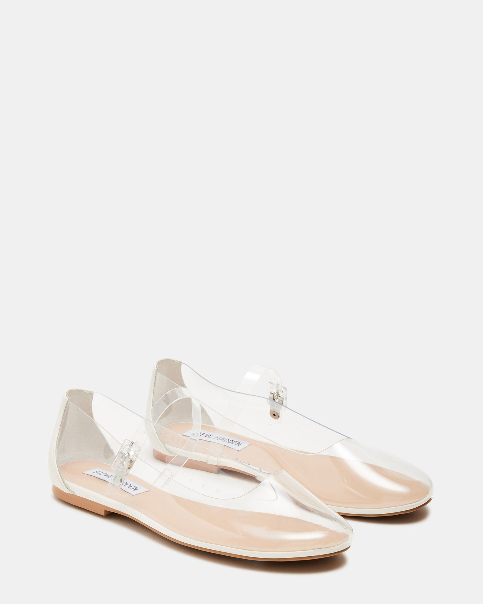 Vinetta Clear shoes worn casually in a sunny outdoor setting, perfect for everyday wear.