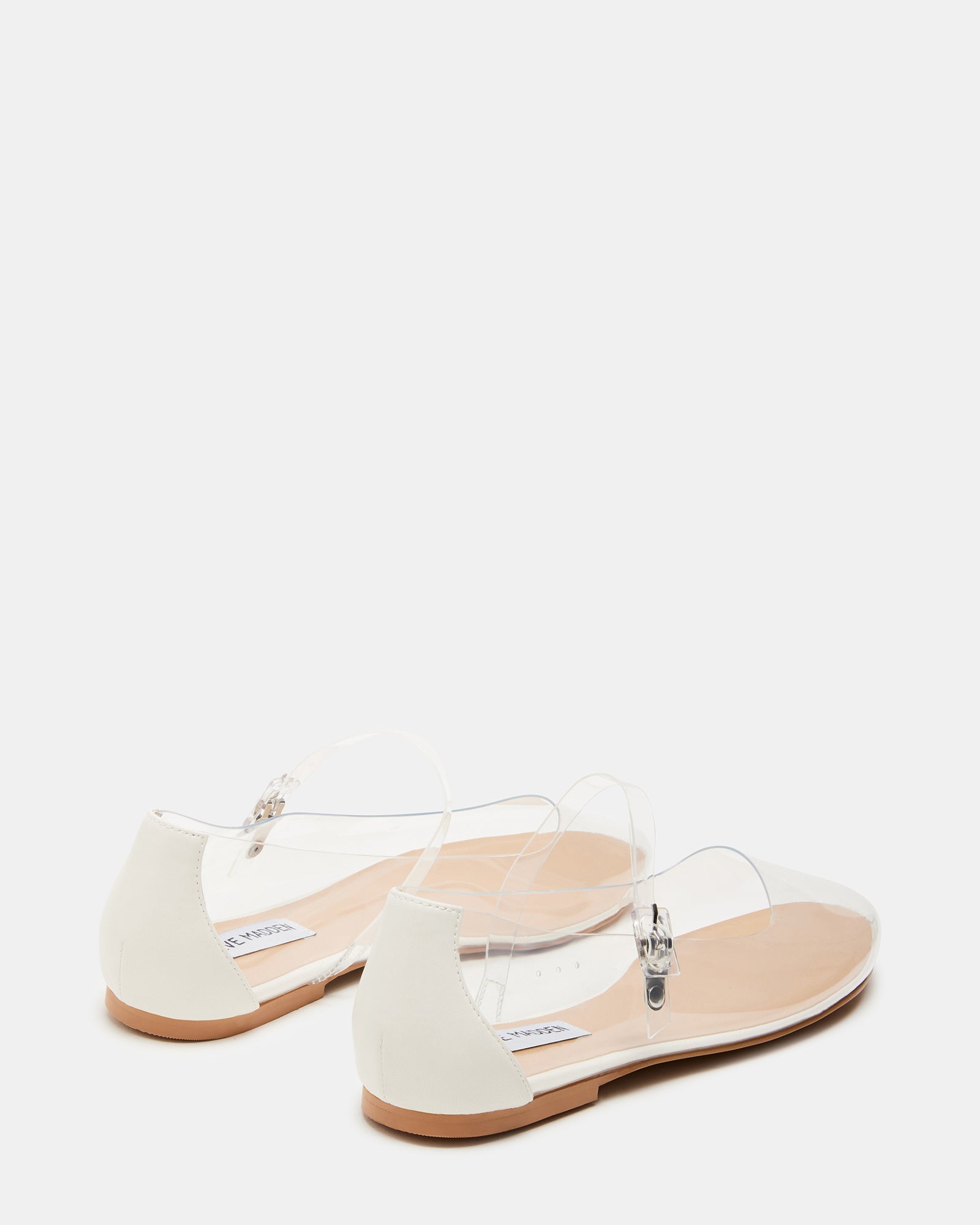 Vinetta Clear shoes worn casually in a sunny outdoor setting, perfect for everyday wear.