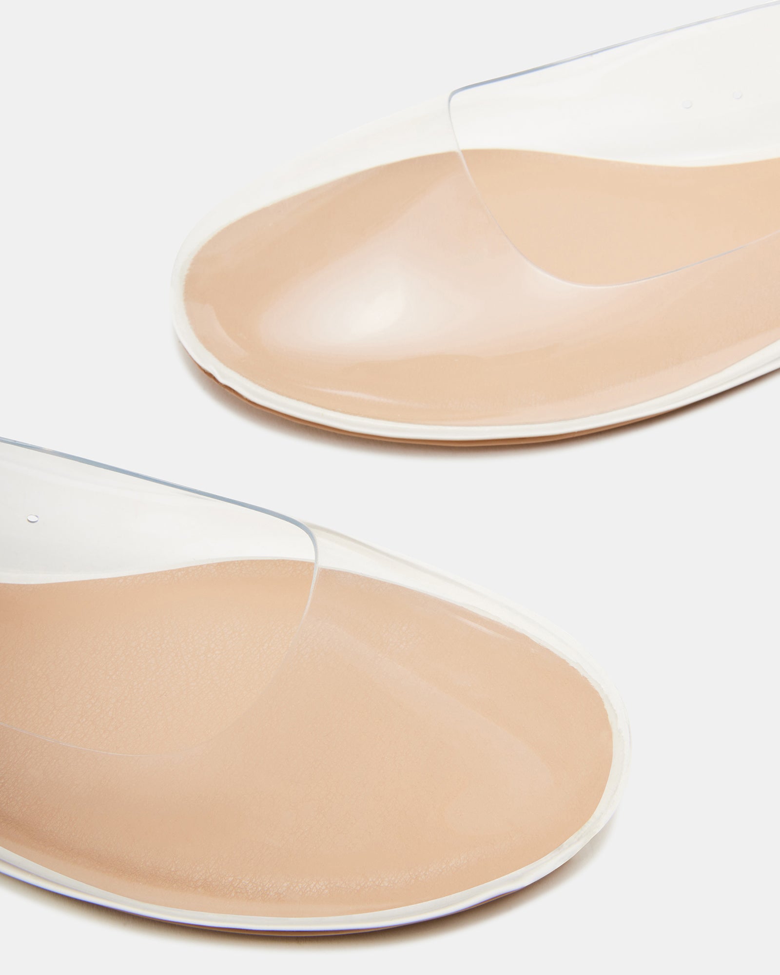 Vinetta Clear vegan Mary Jane shoes from the side, highlighting the buckle strap.