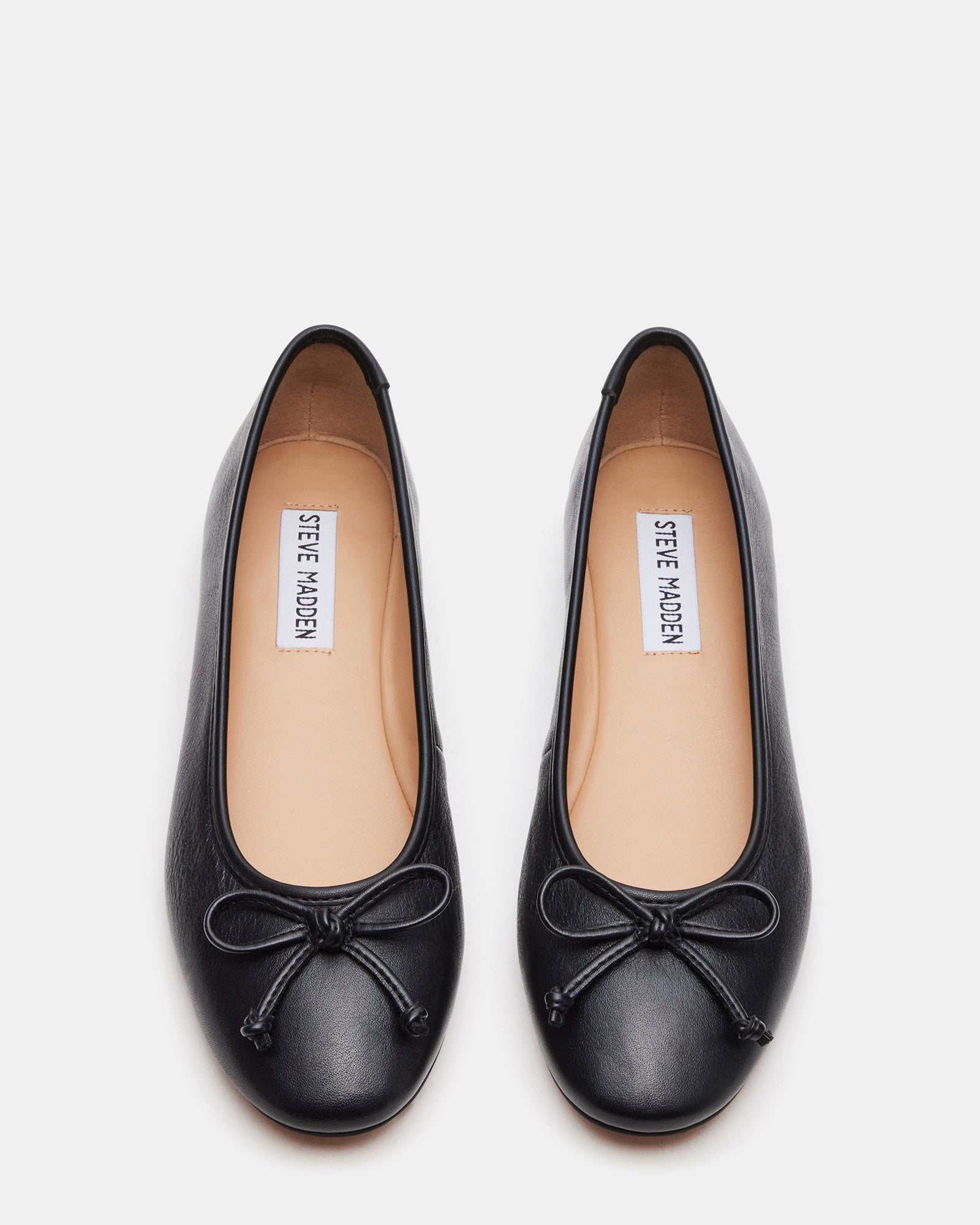 Close-up of bow detail on Vixen ballet flats.