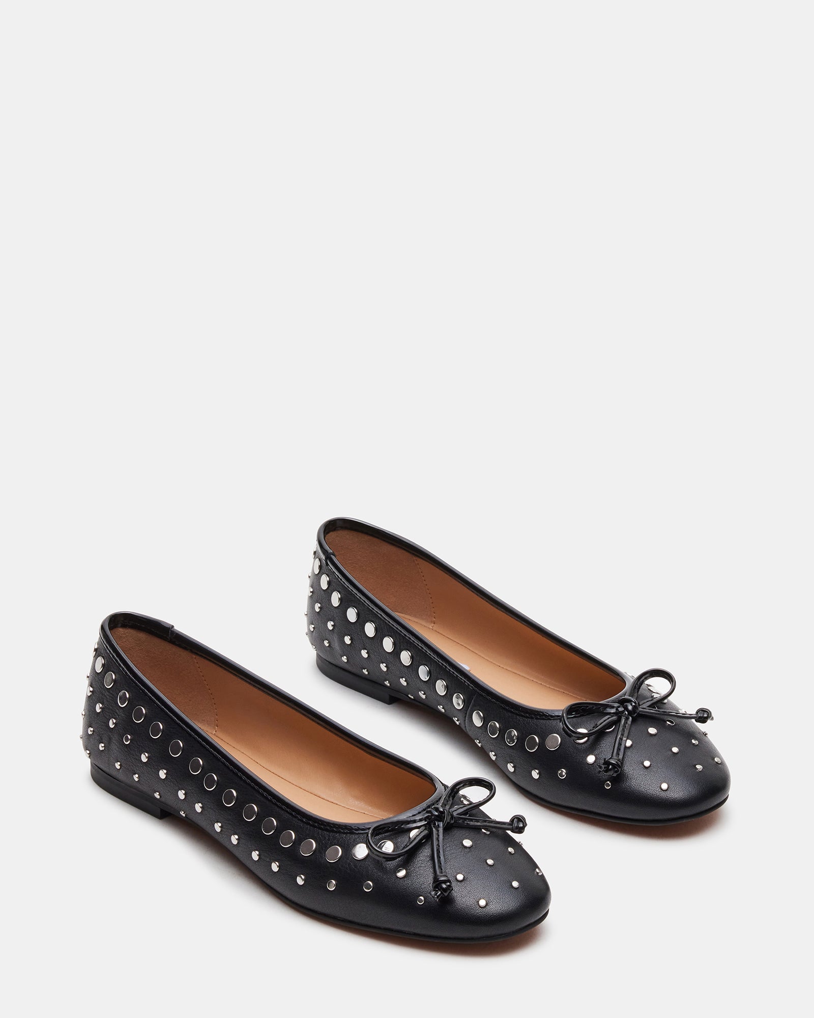 Side profile of stylish womens ballet flats with hardware embellishments
