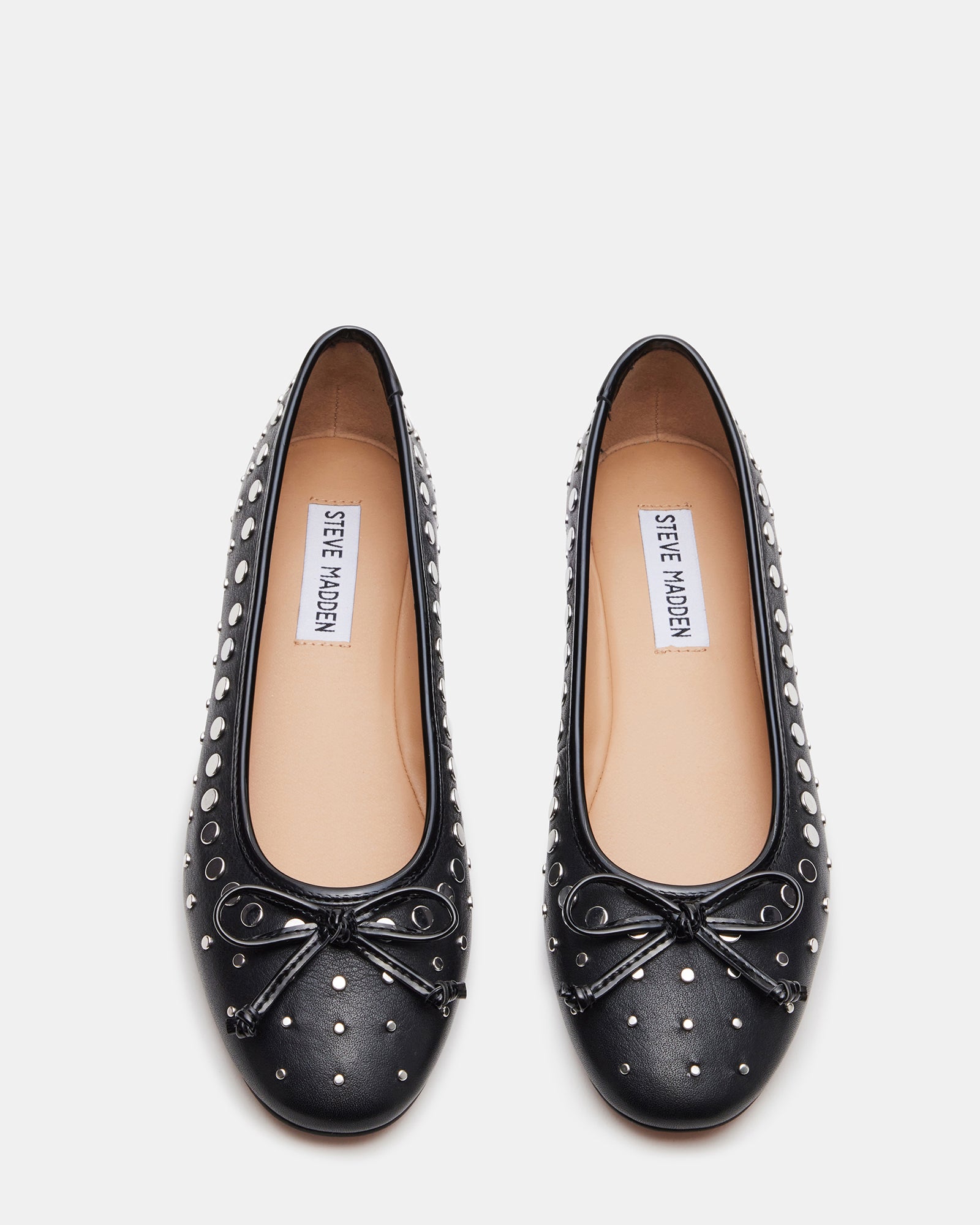 Front view of VIXEN black leather ballet flats with stud details and bow