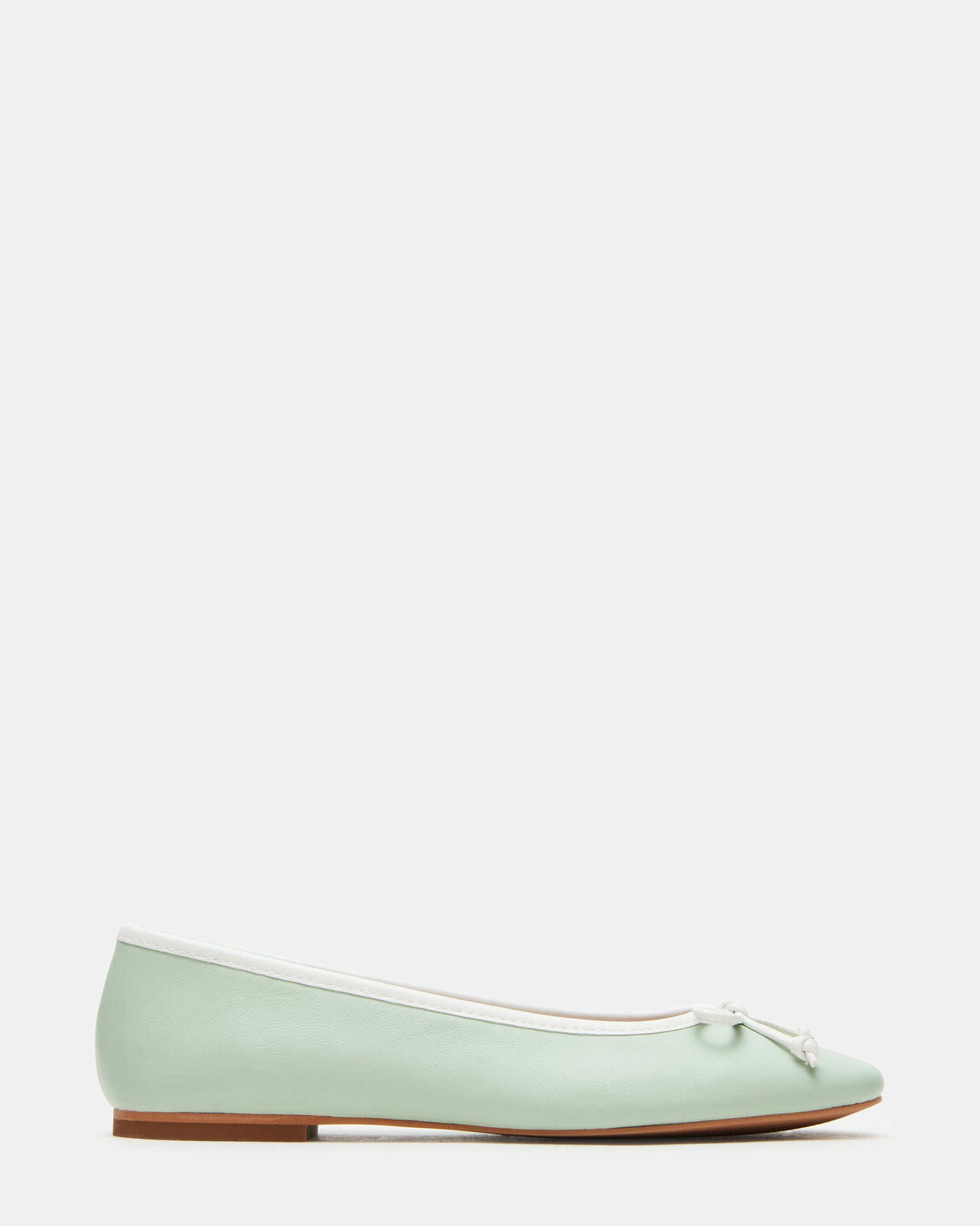 Vixen Pistachio ballet flats with front bow detail, styled with a dress.