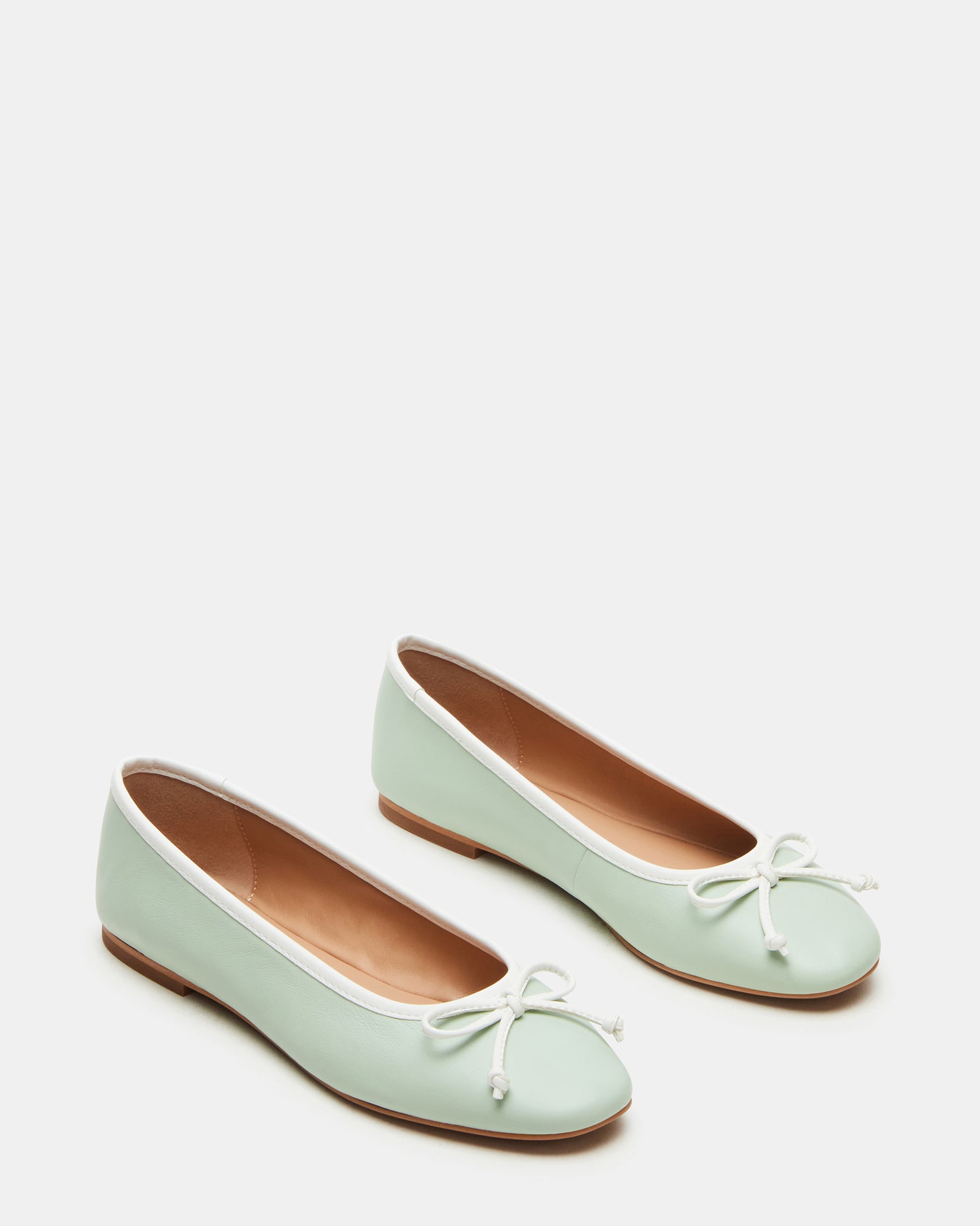 Side view of comfortable ballet flats showing rounded toe design.
