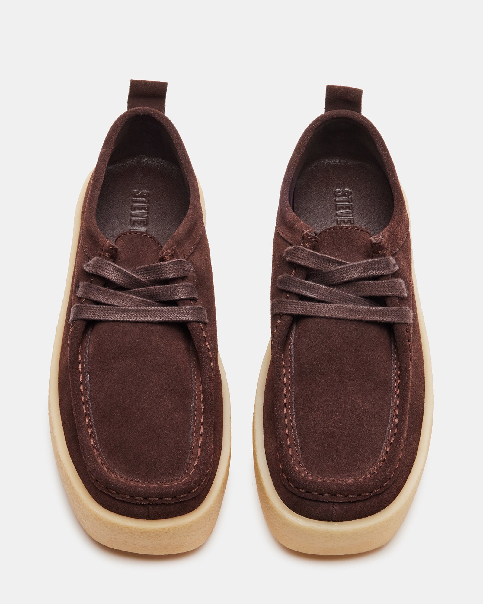 Brown suede loafers with colored laces, ideal for casual and formal wear.