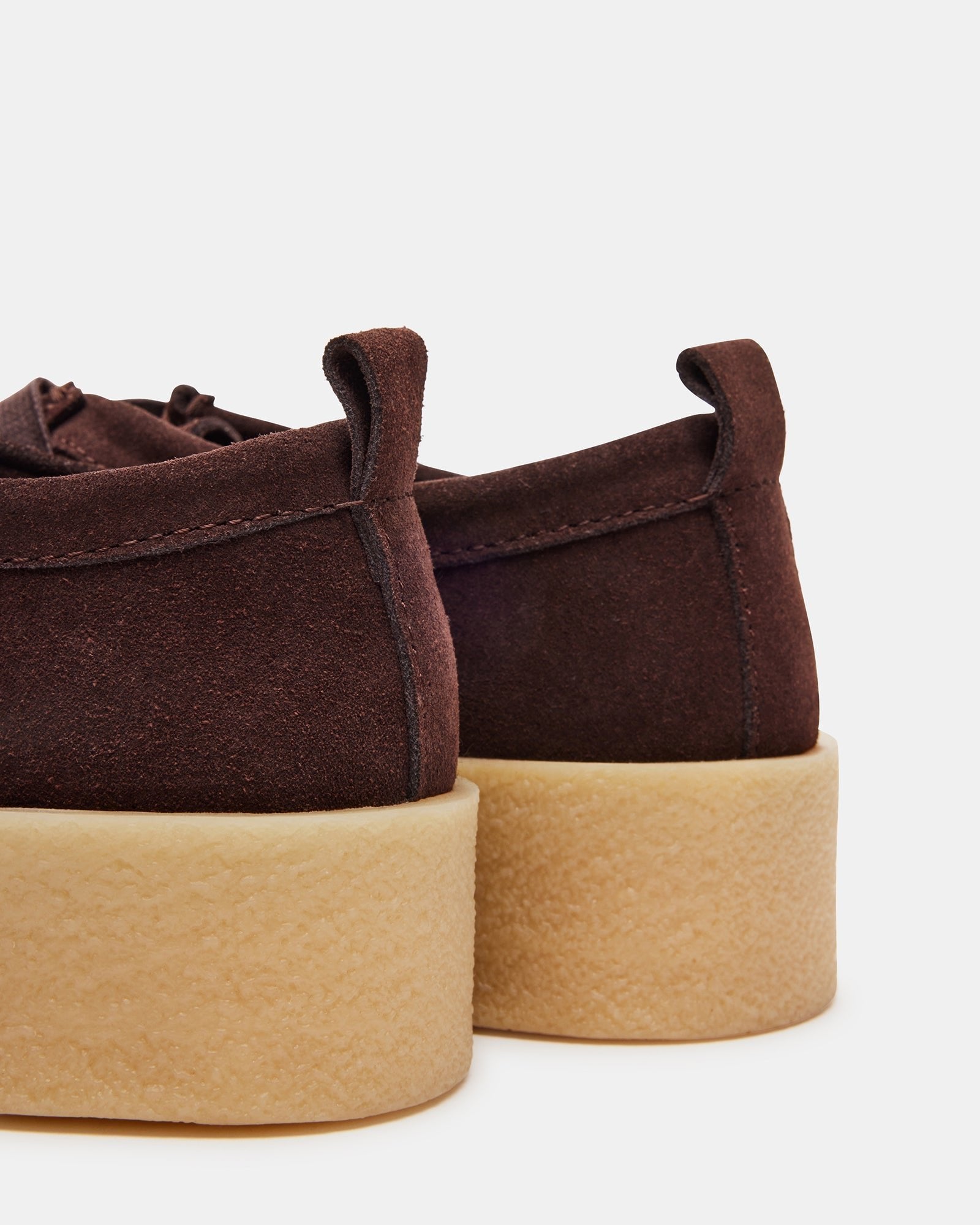 Close-up of the suede texture on womens platform loafers with wallabee style.
