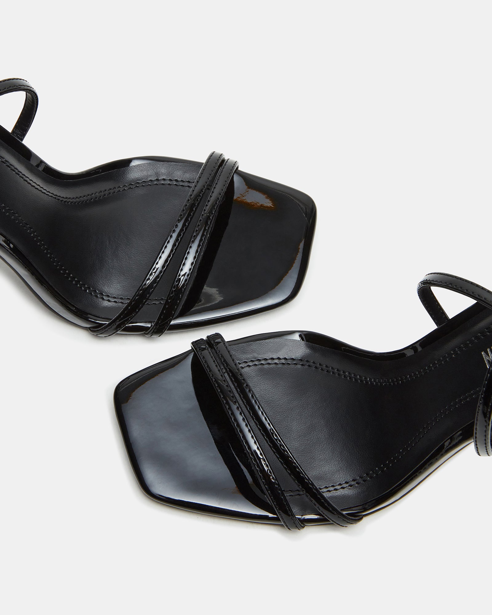 Side profile showing gold heel accent on white background