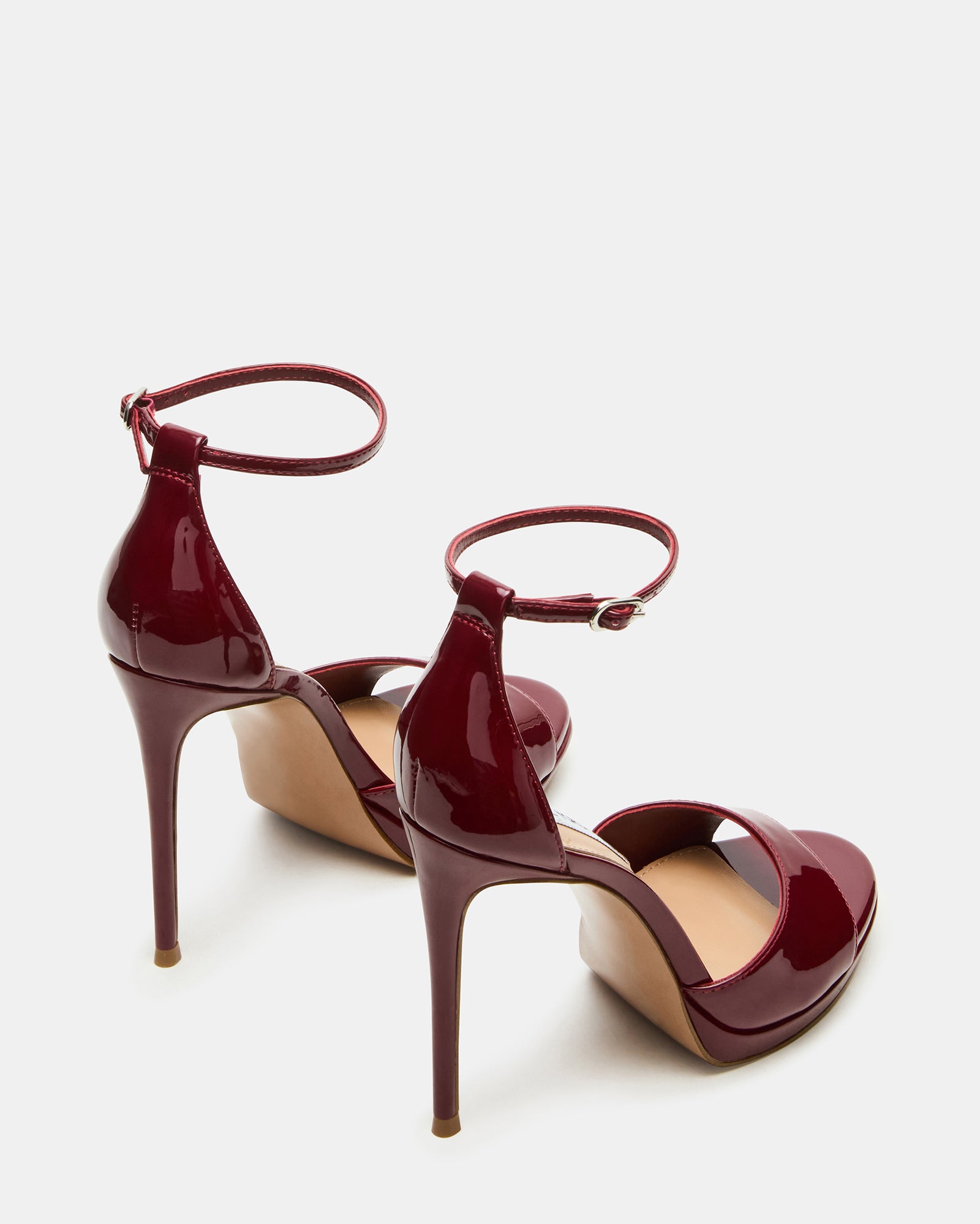 Worn black stiletto heels in a stylish outfit, perfect for a night out.