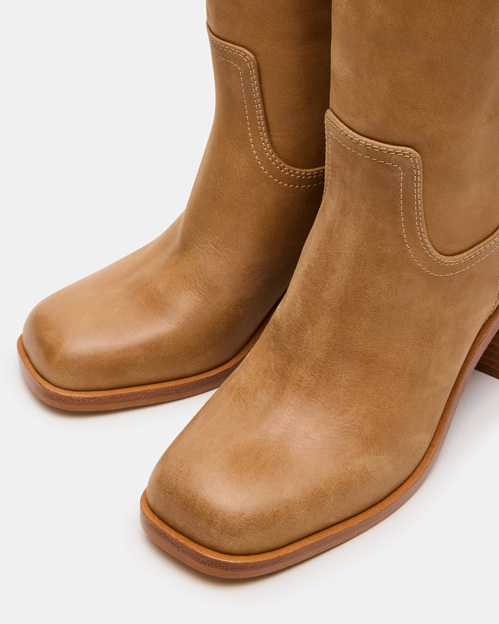 Close-up of the leather upper and synthetic sole of Woodstock boots