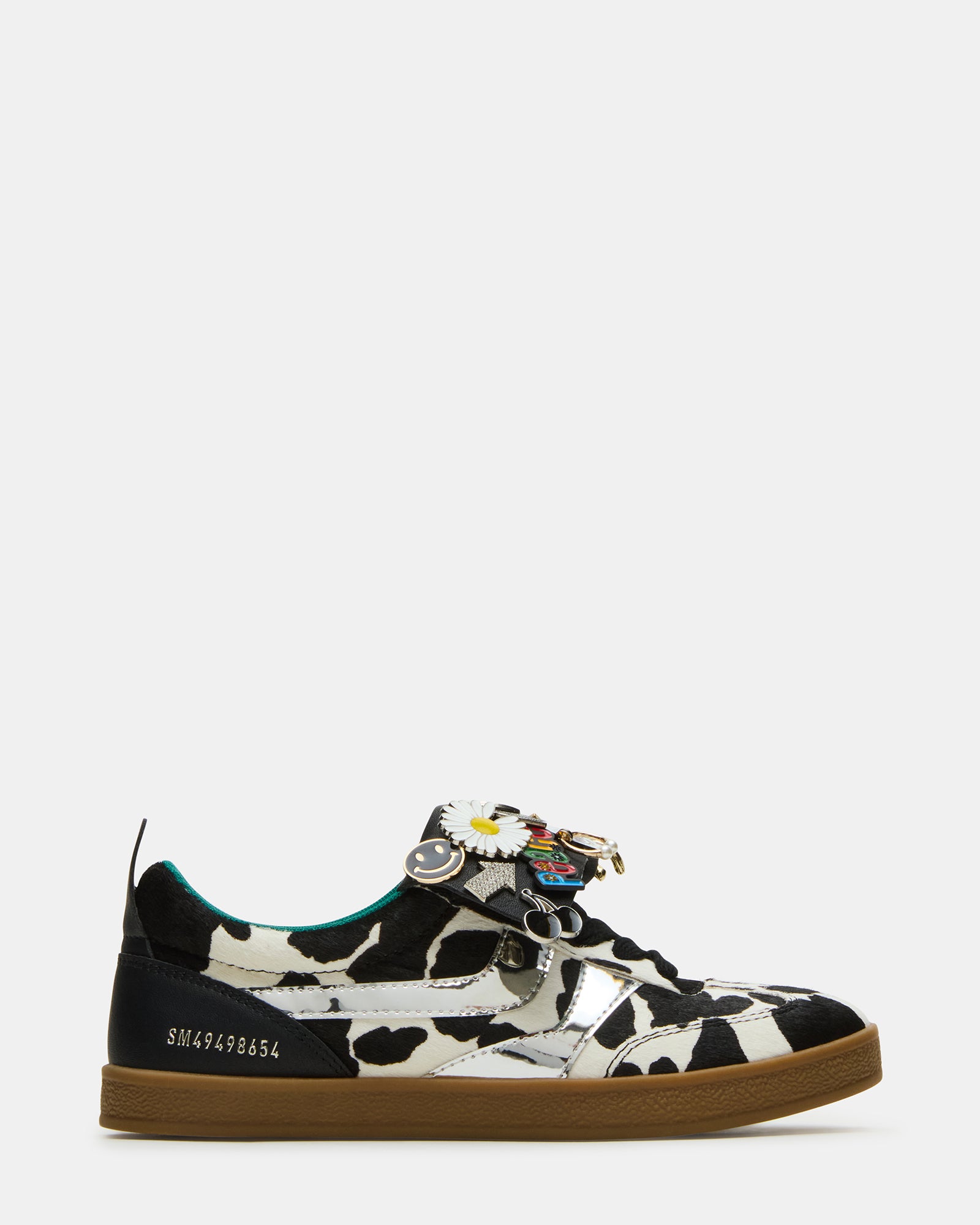 Front view of Custom Wyatt Black Cow Print Sneakers with colorful pins