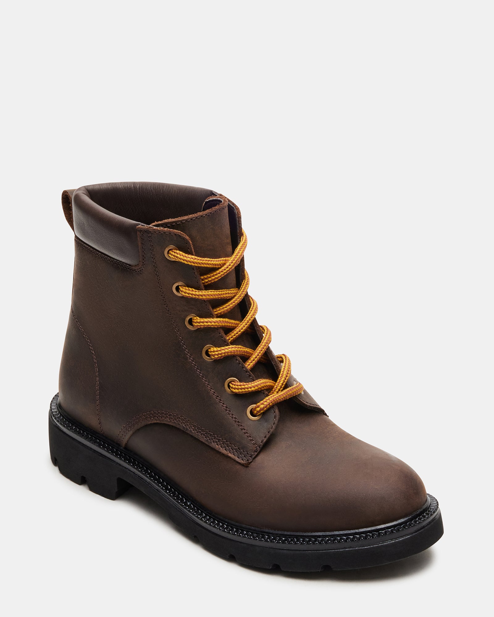 Angled shot of lug sole boots designed for outdoor terrain and urban wear