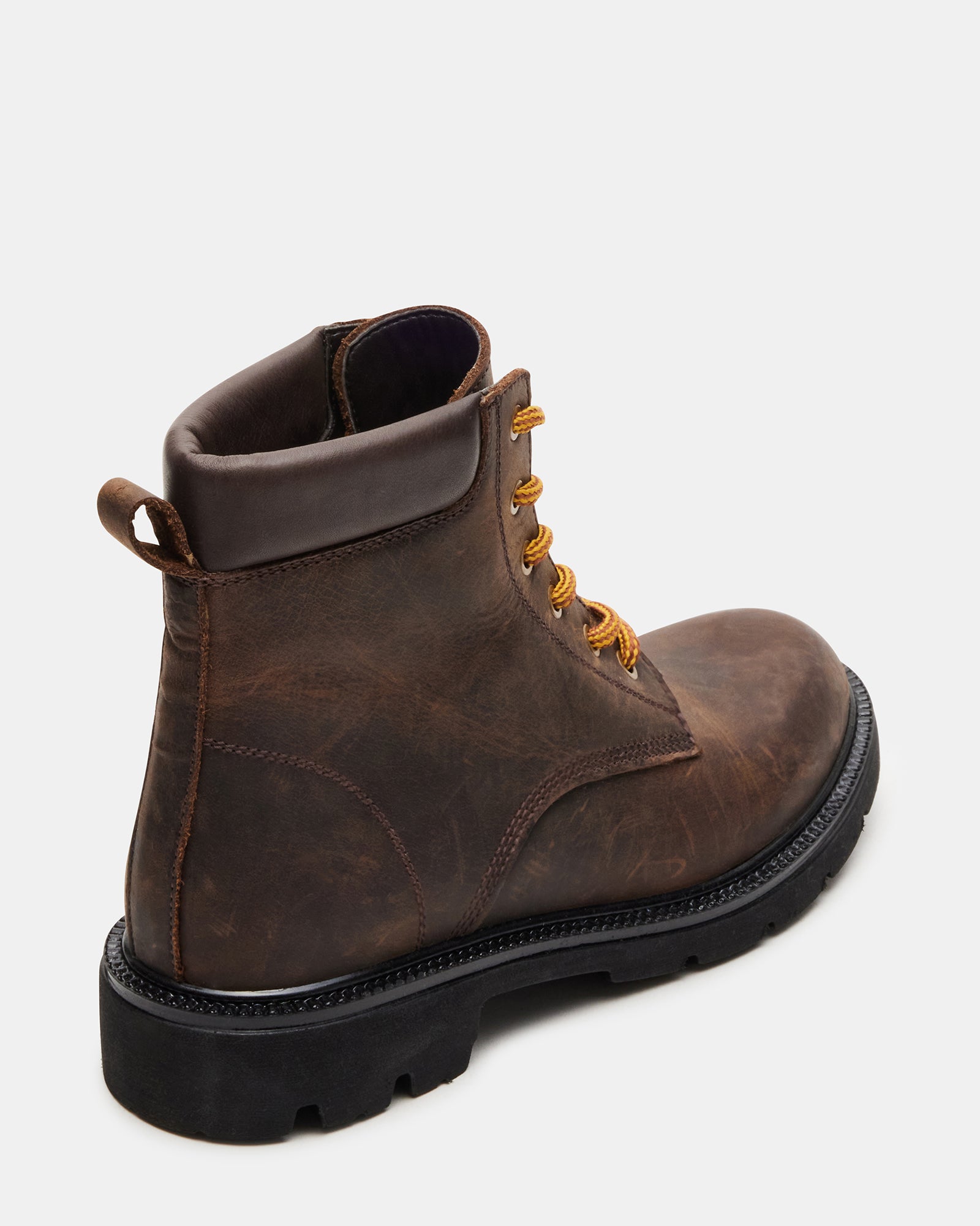 Angled shot of lug sole boots designed for outdoor terrain and urban wear