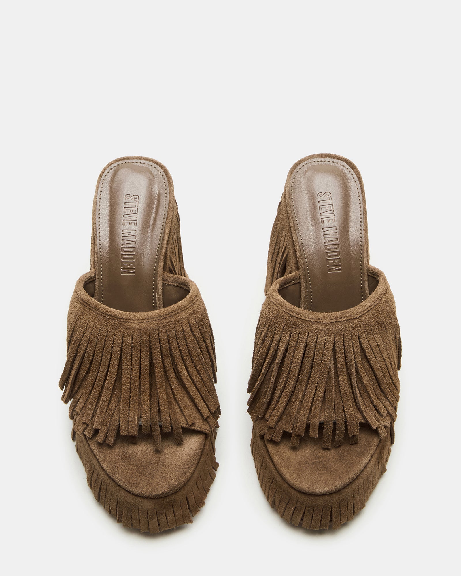 Side view of Wynn platform shoes with chic fringe detail
