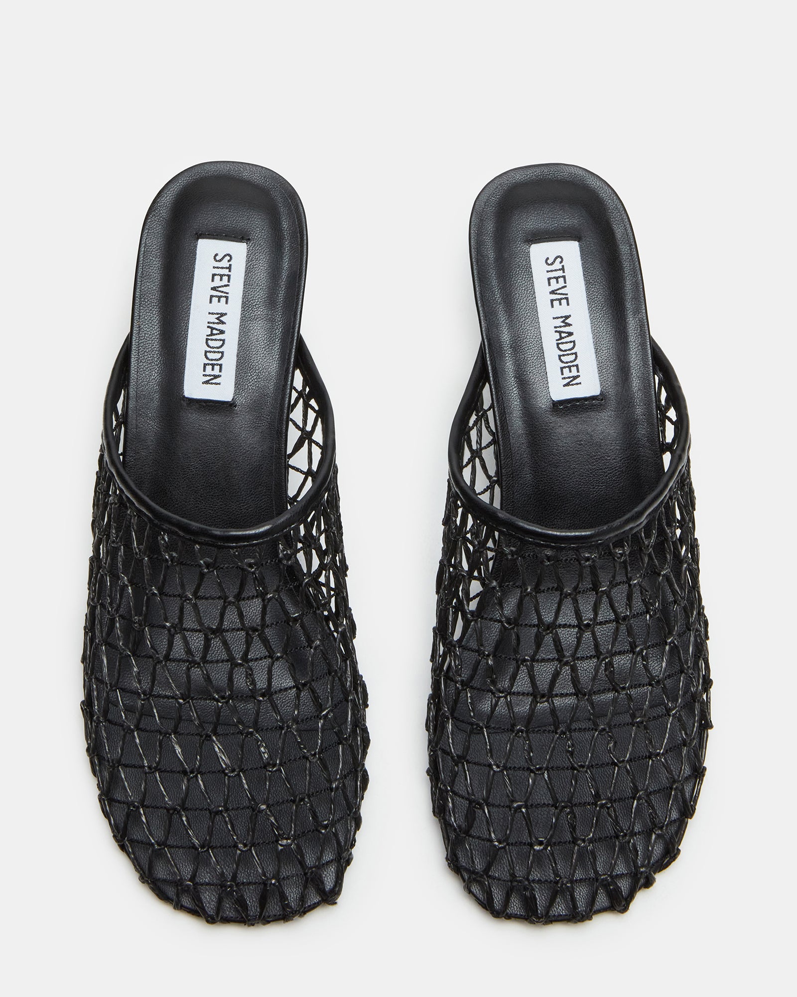 Side view of XRAY Black mule shoes with raffia and caged design for women.