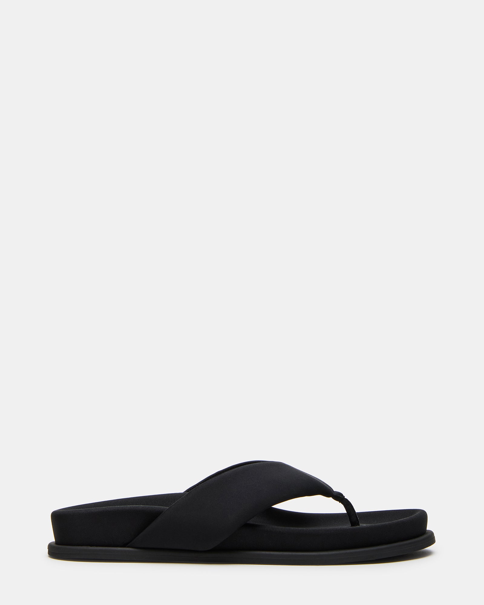 Side view of Zinnia black thong sandals showcasing the rounded toe design