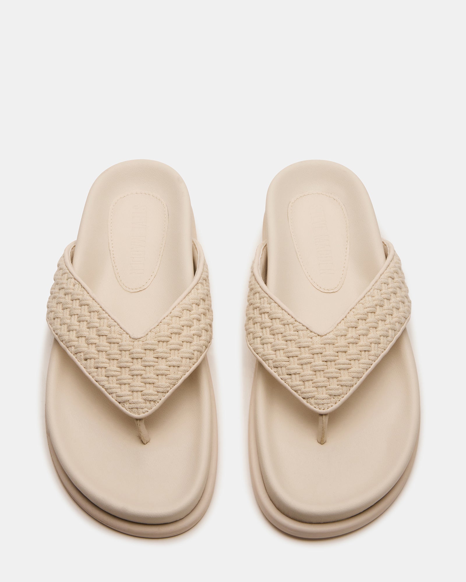 Close-up of Zinnia Bone Multi womens thong sandals showcasing the supportive footbed and stylish design