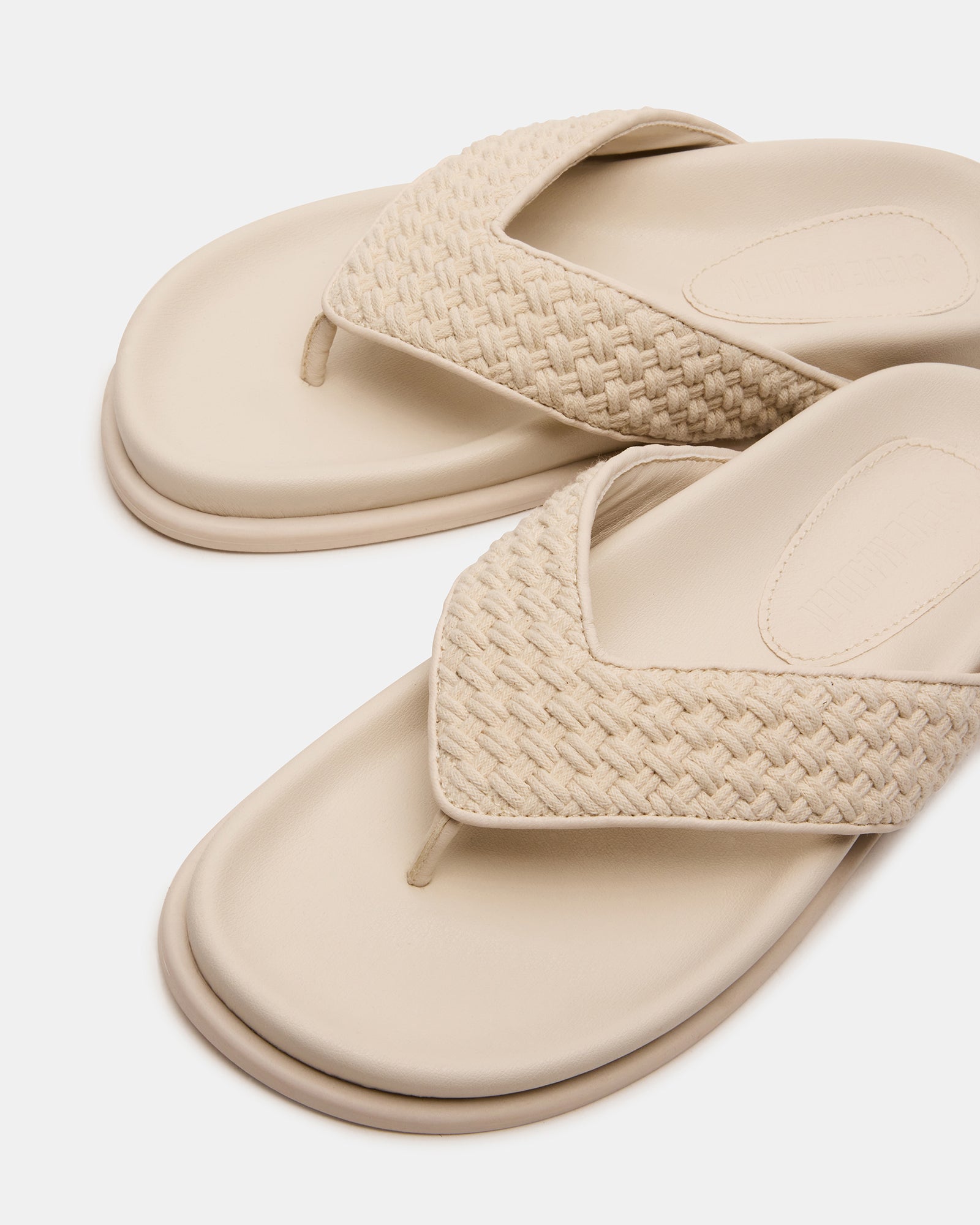 Fashionable thong sandals worn with casual summer outfits for everyday comfort