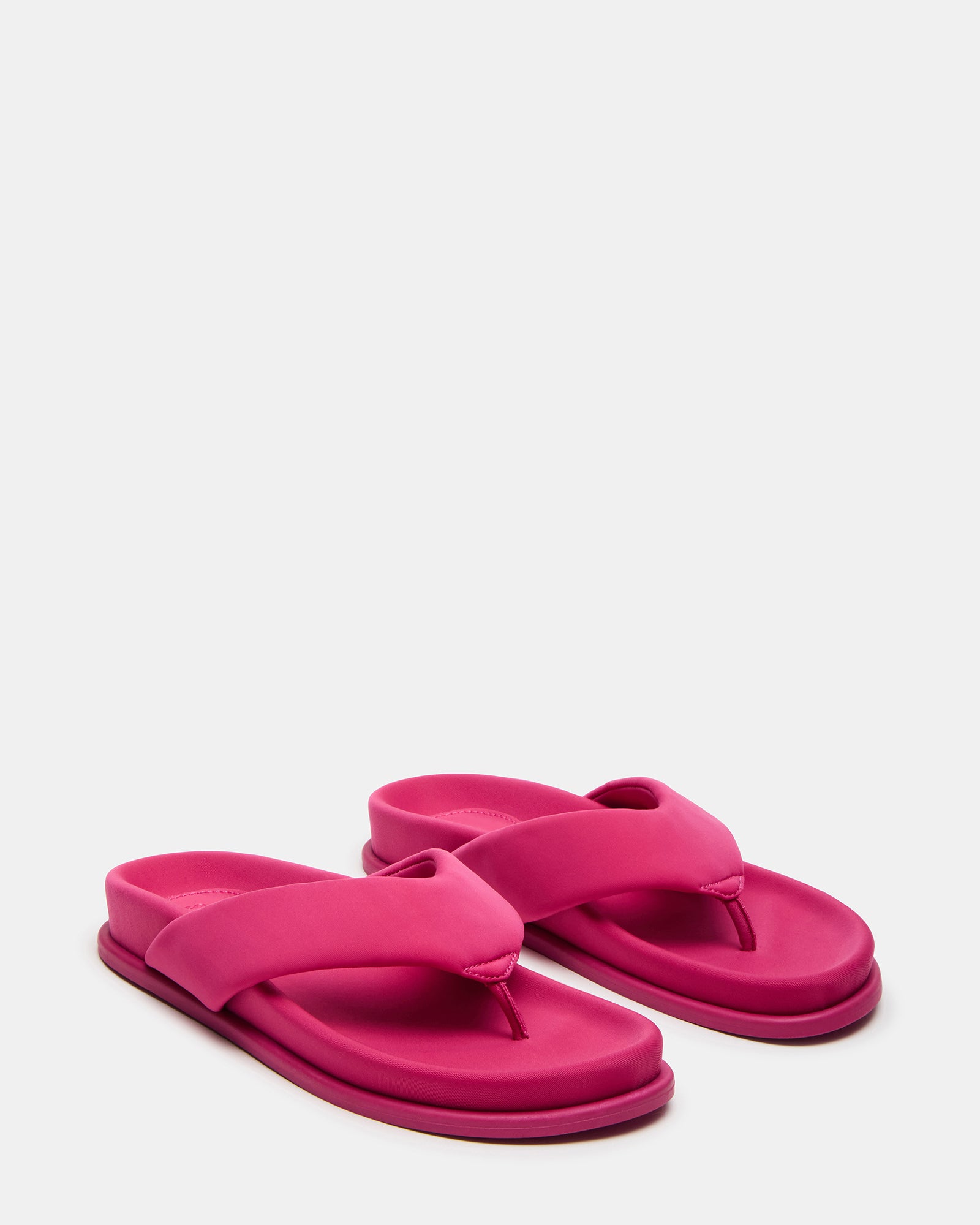 Top angle of comfortable sandals showing padded footbed and rounded toe