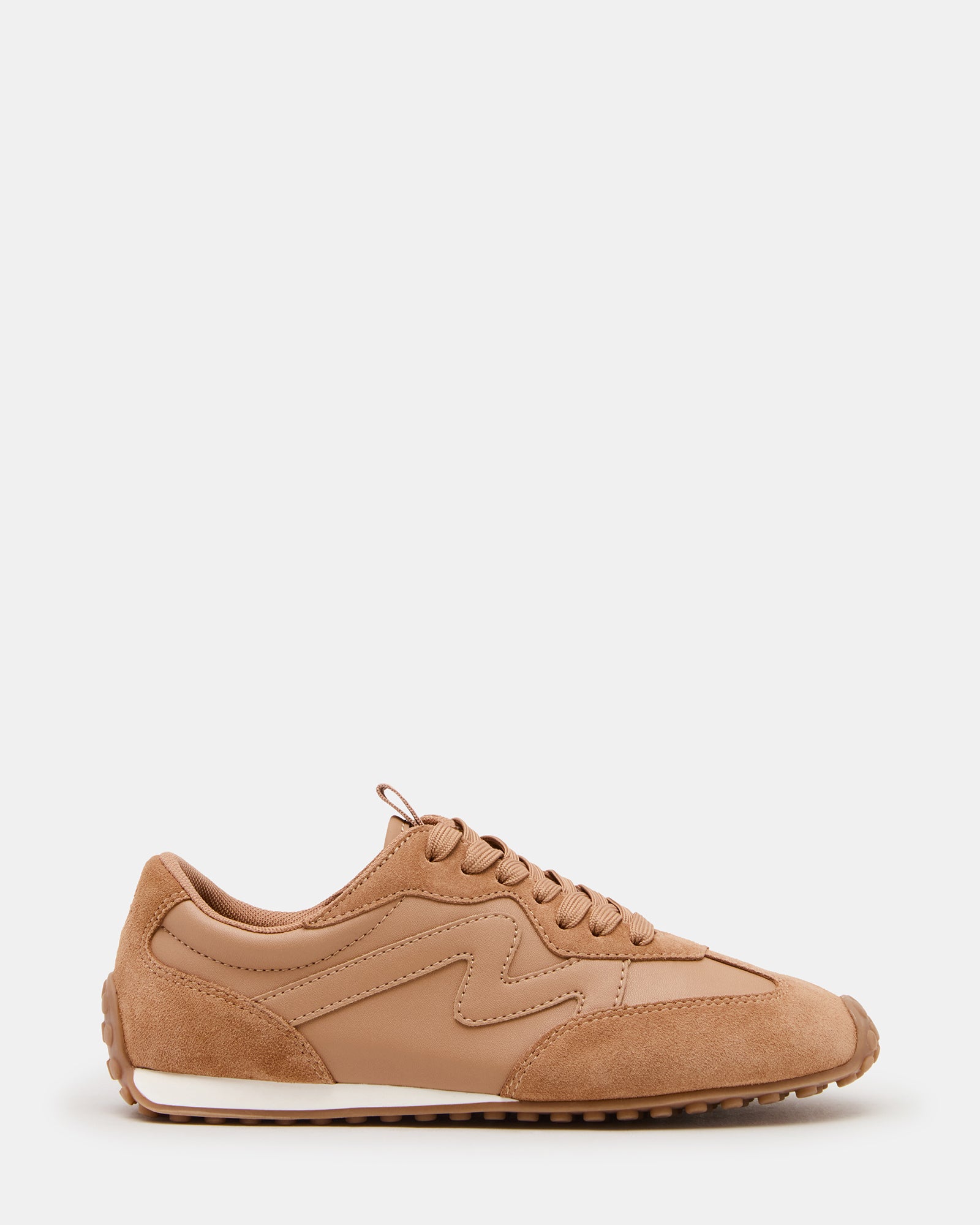 Side view of low-top sneakers with tan suede finish and lace-up design