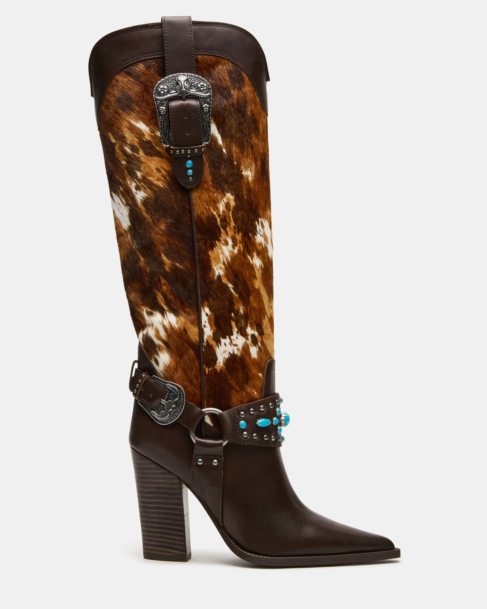 Side view of brown cowboy boots with buckle and pointed toe